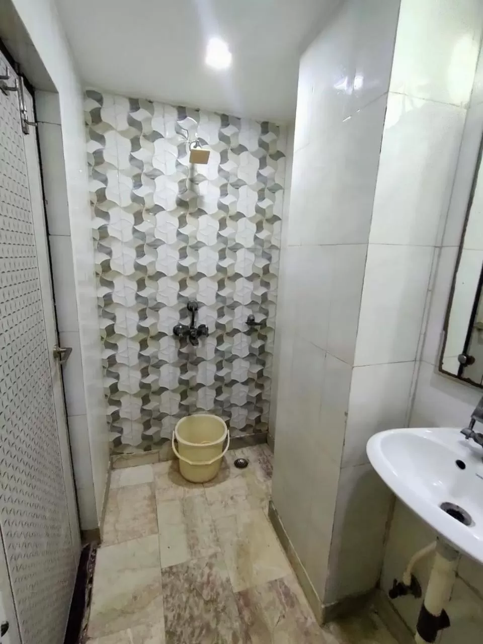 Bathroom in Hotel Laxman Resort by The Golden Taj Group &Hotels