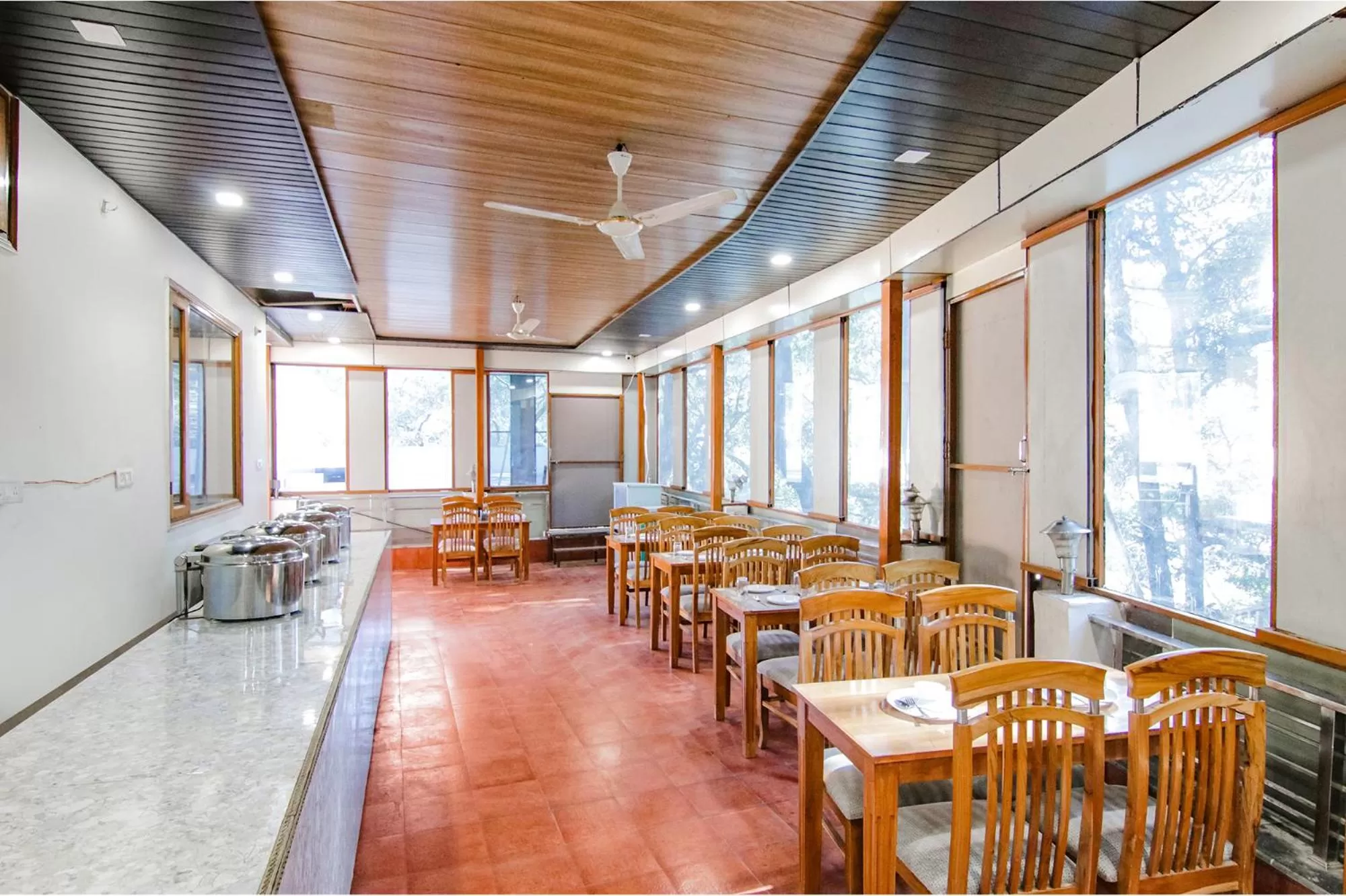 Restaurant/Places to Eat in FabHotel Prime Olive Lake View