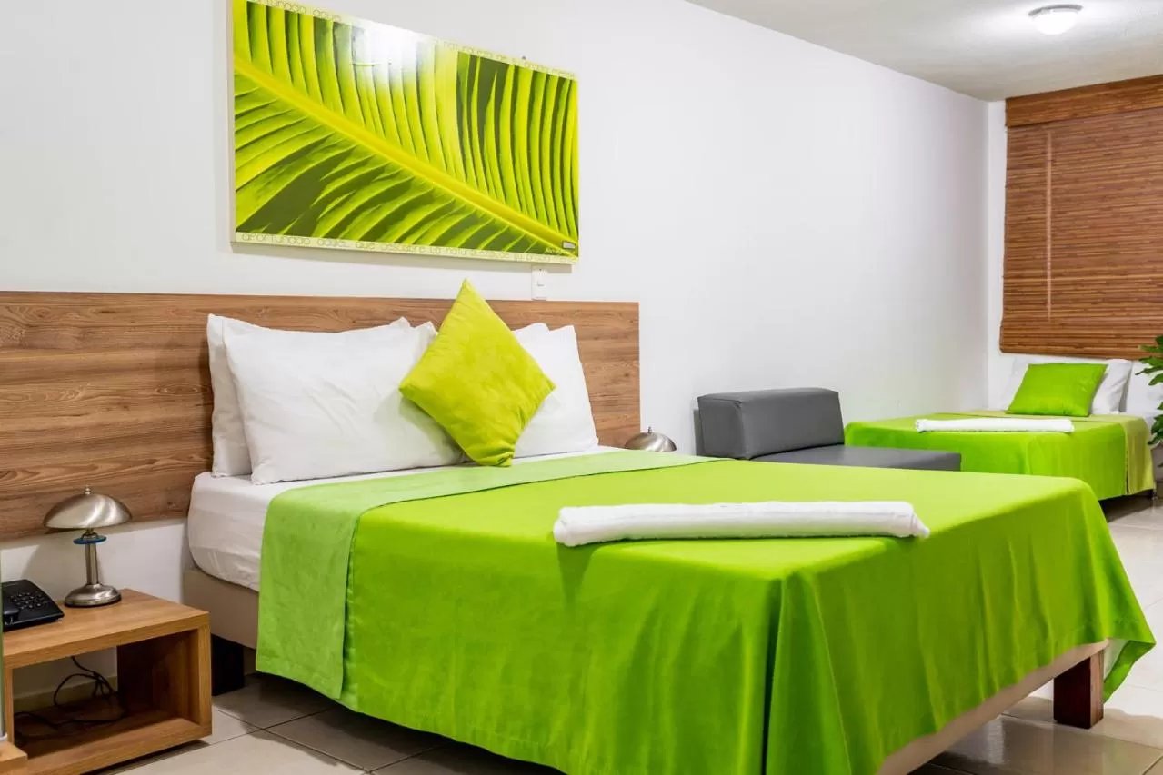 Bed in Hotel Condina Pereira