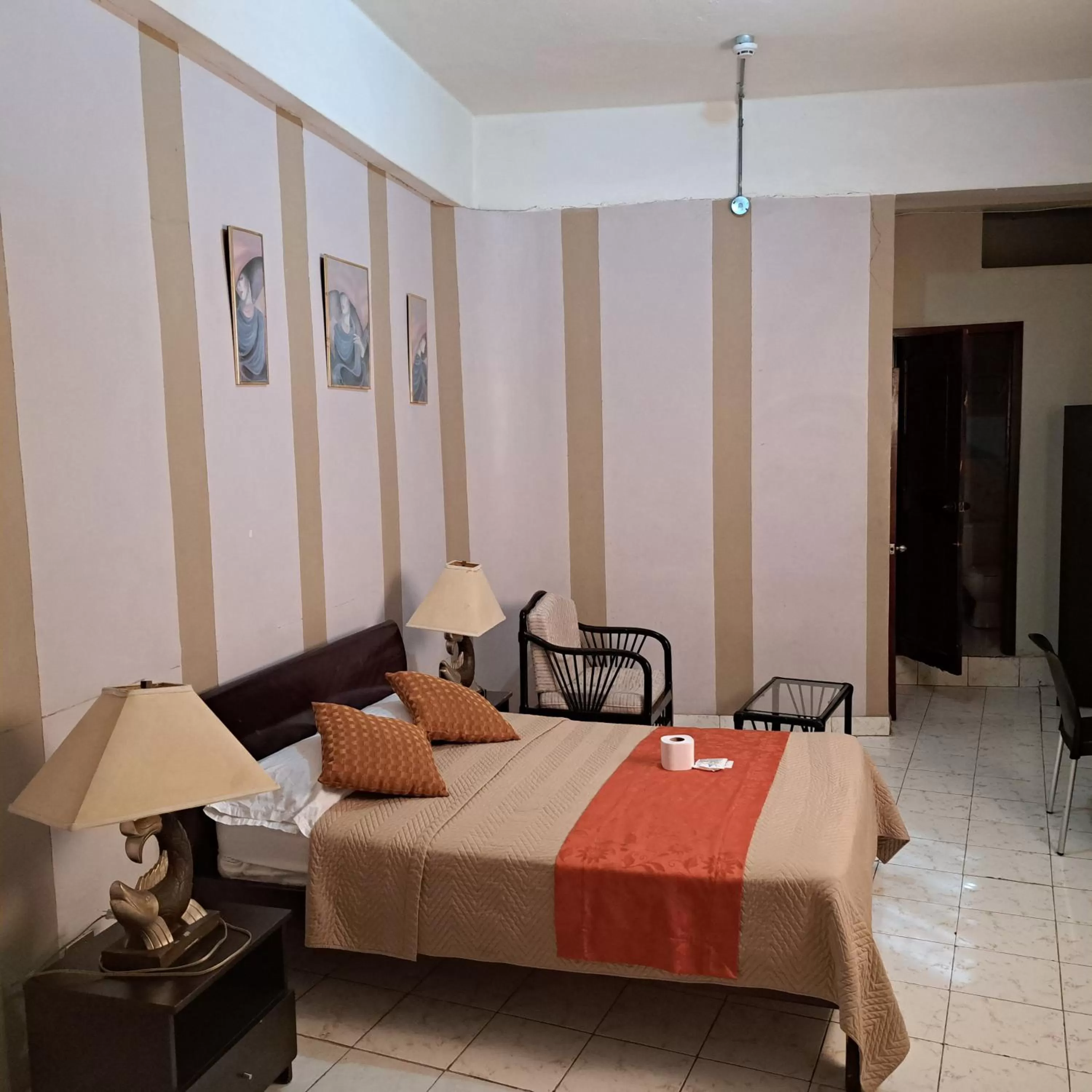 Photo of the whole room, Bed in Atlantic Suites Hotel