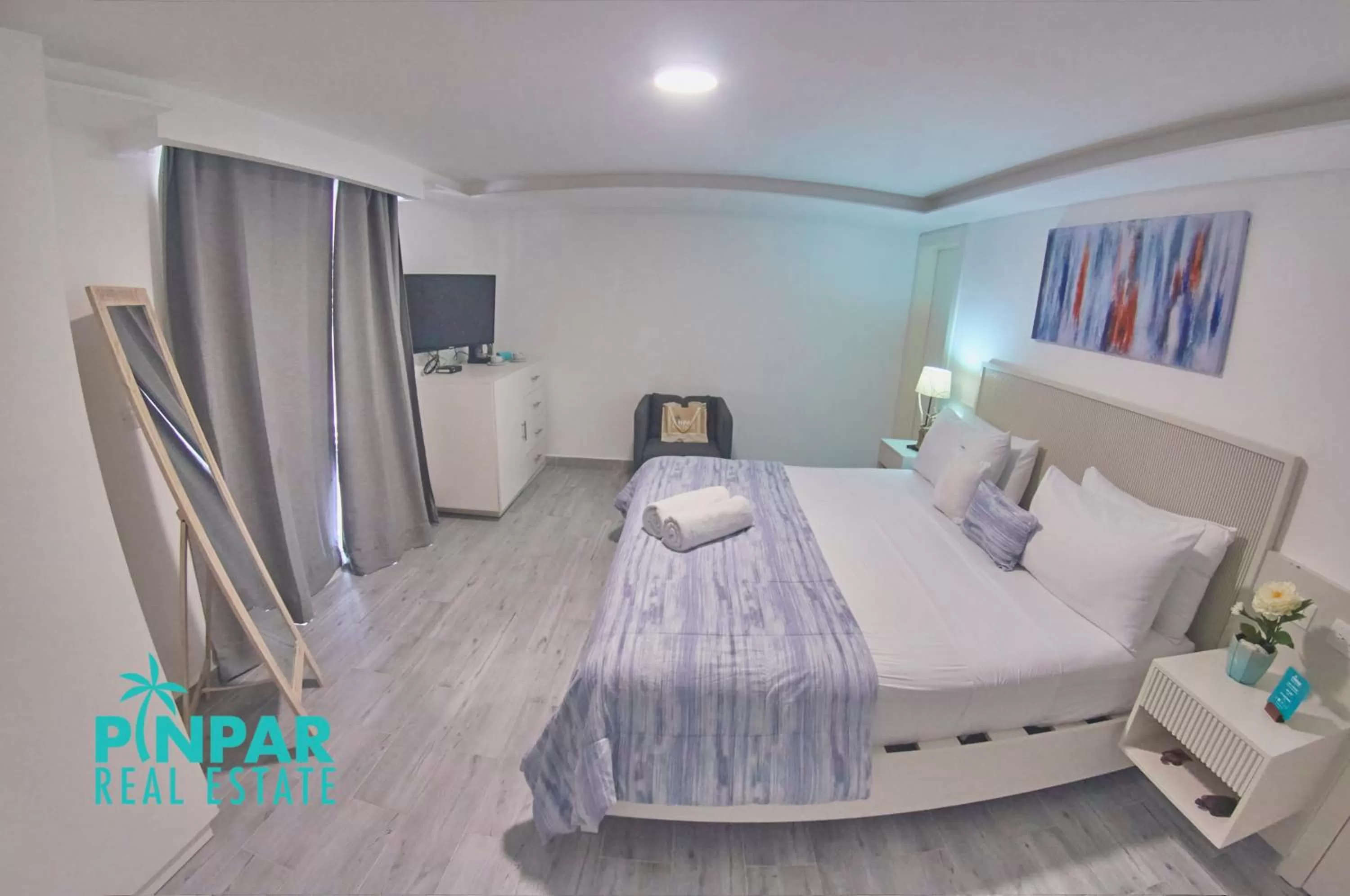 Communal lounge/ TV room, Bed in Villa Blanca Beach Club