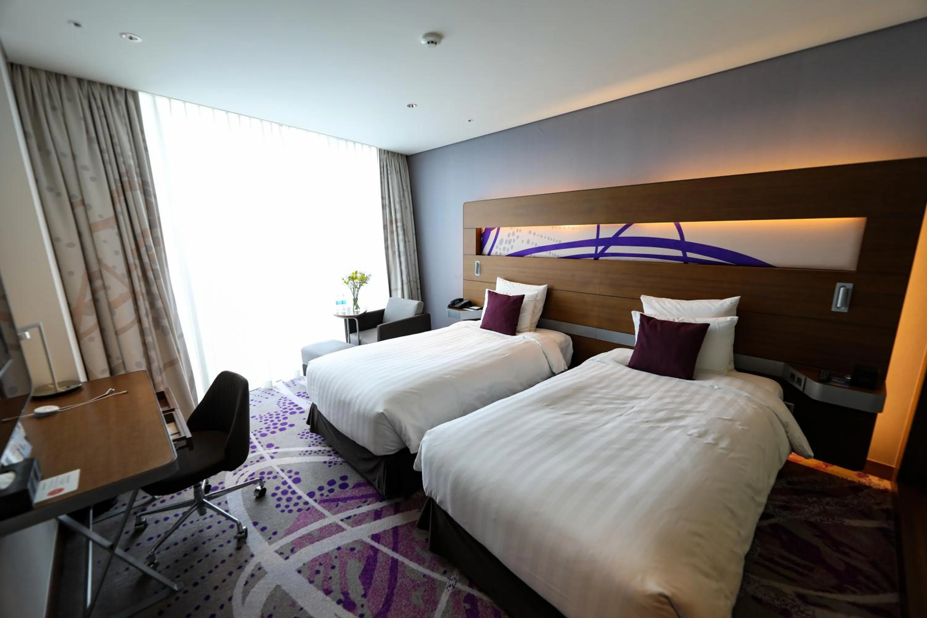 Bed in Novotel Ambassador Suwon