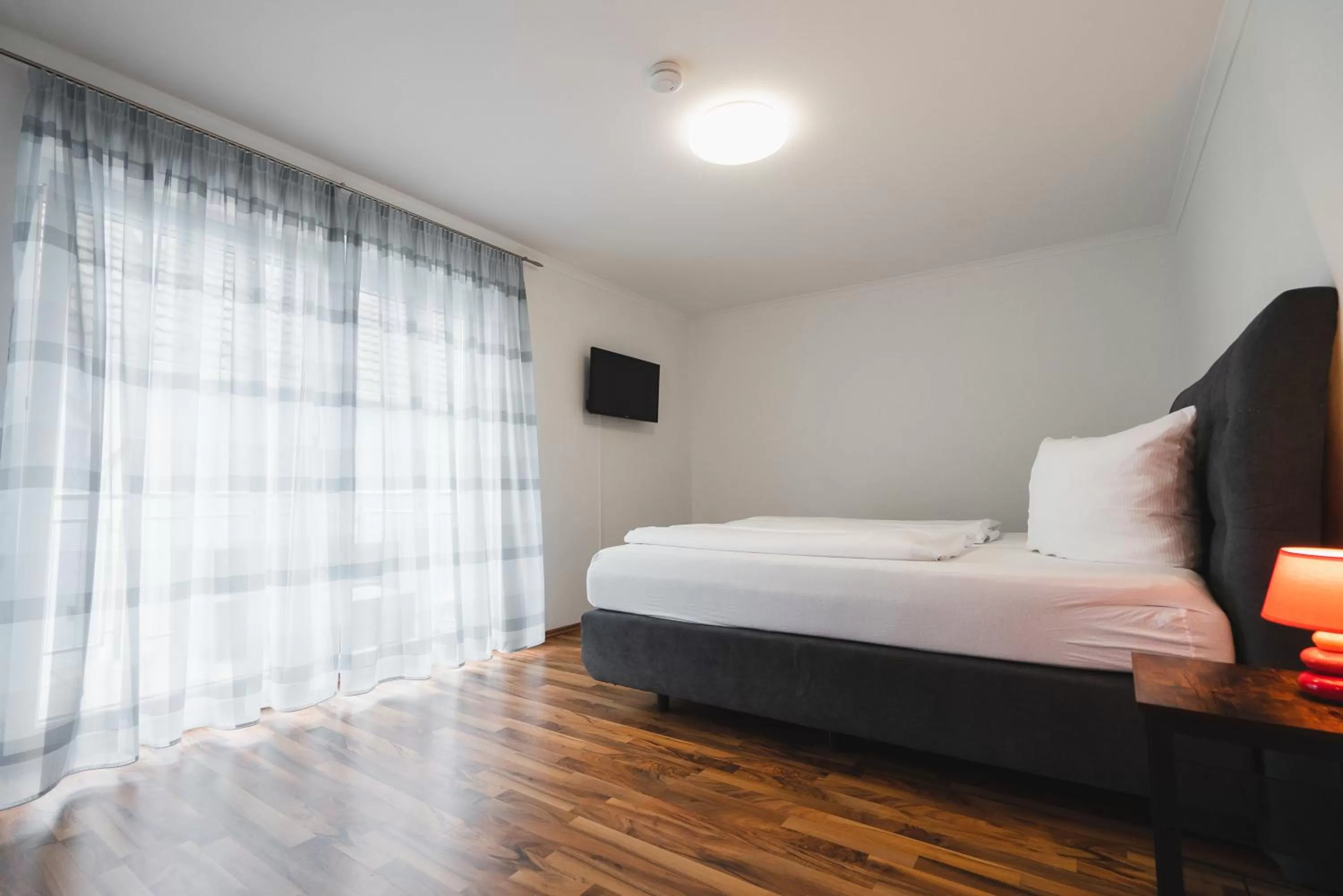 Bed in Park Hotel & Gästehaus Rust