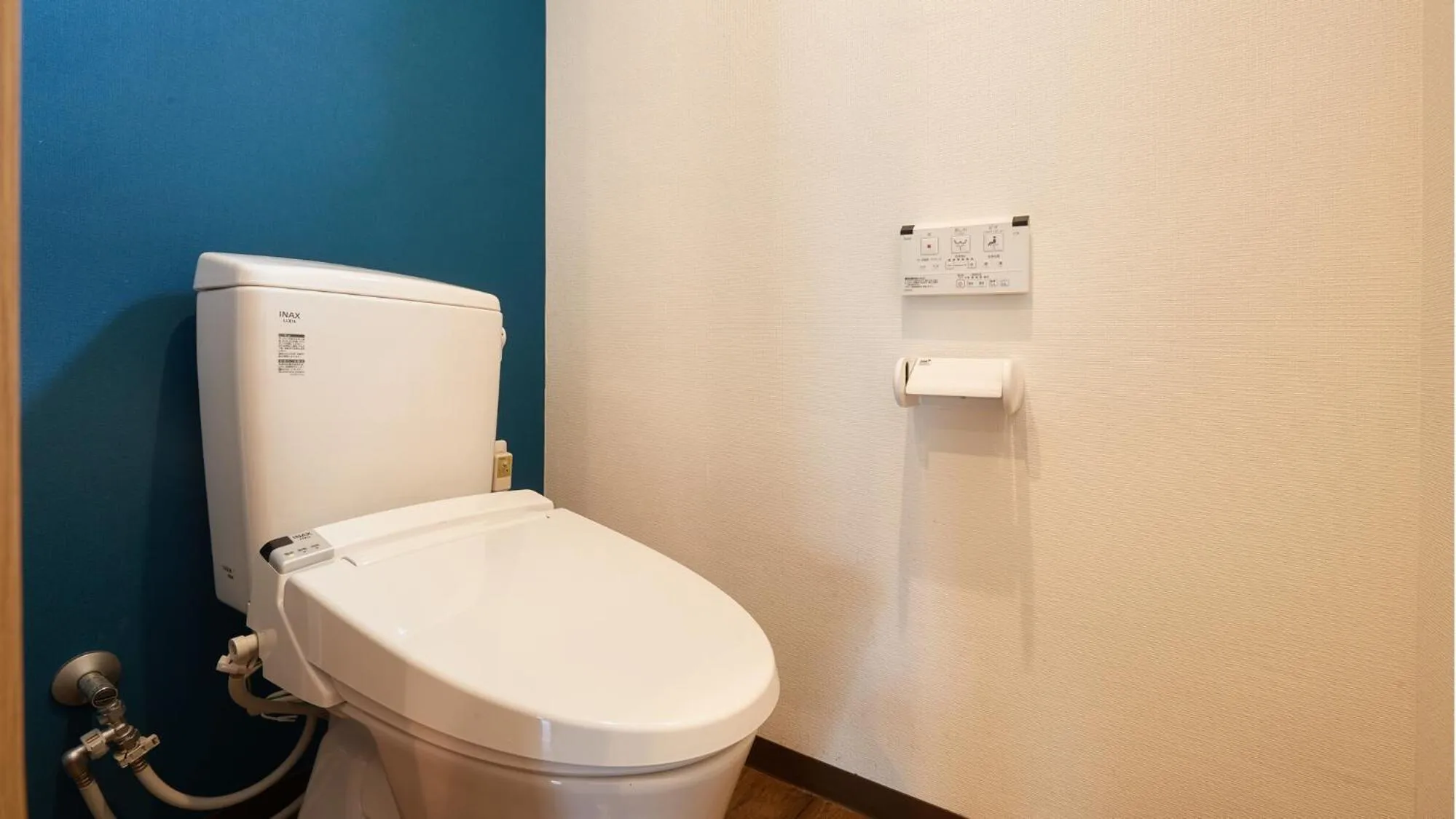 Toilet in New Normal Hotel in NAMINOUE ニューノーマルホテルイン波の上