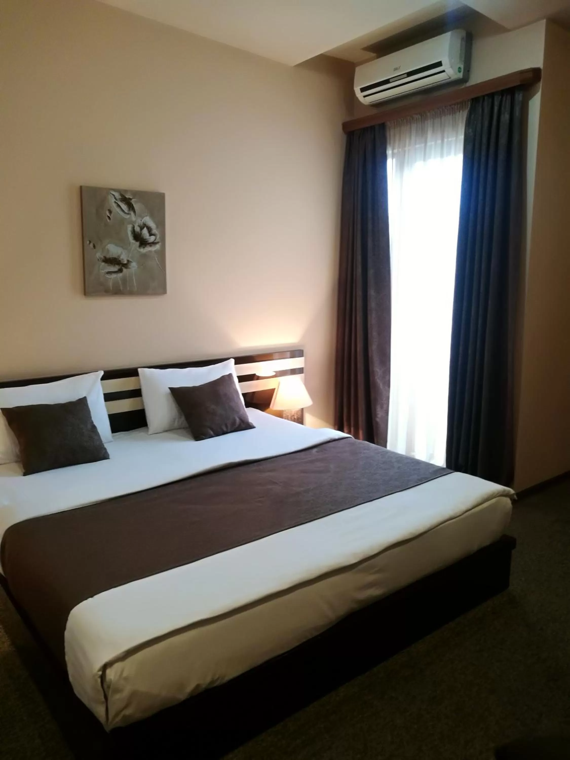 Bed in Hotel Diplomat