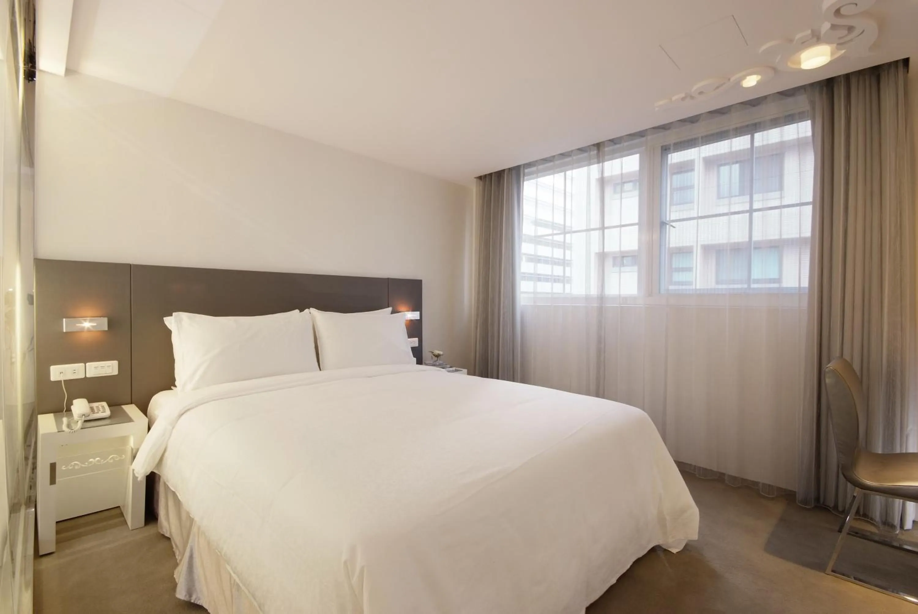 Bed in Forward Hotel Taipei Nangang