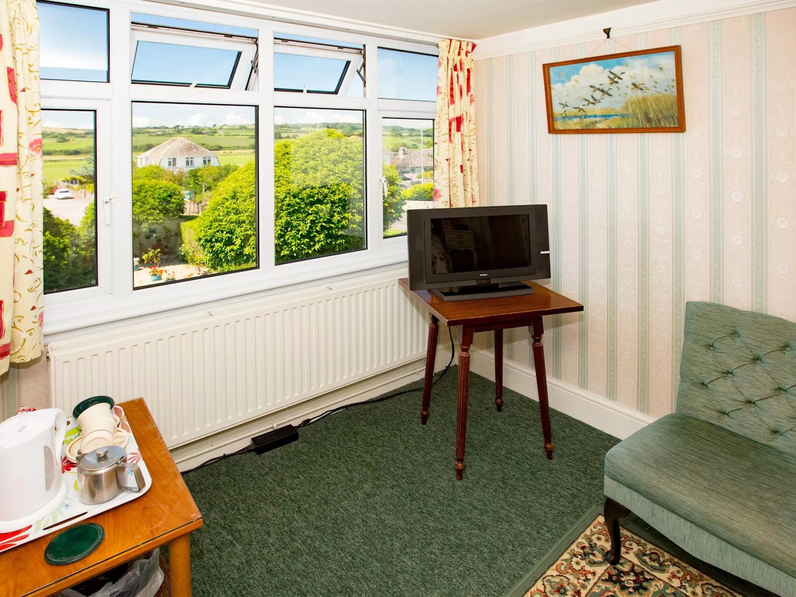 Bedroom, TV/Entertainment Center in Eypeleaze B&B