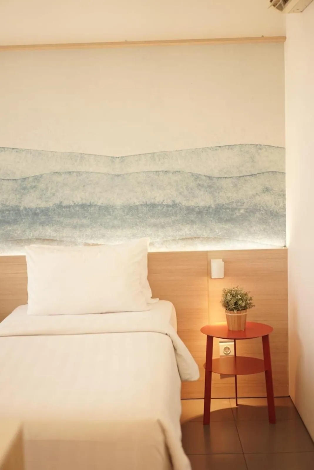 Bed in Malaka Hotel Bandung