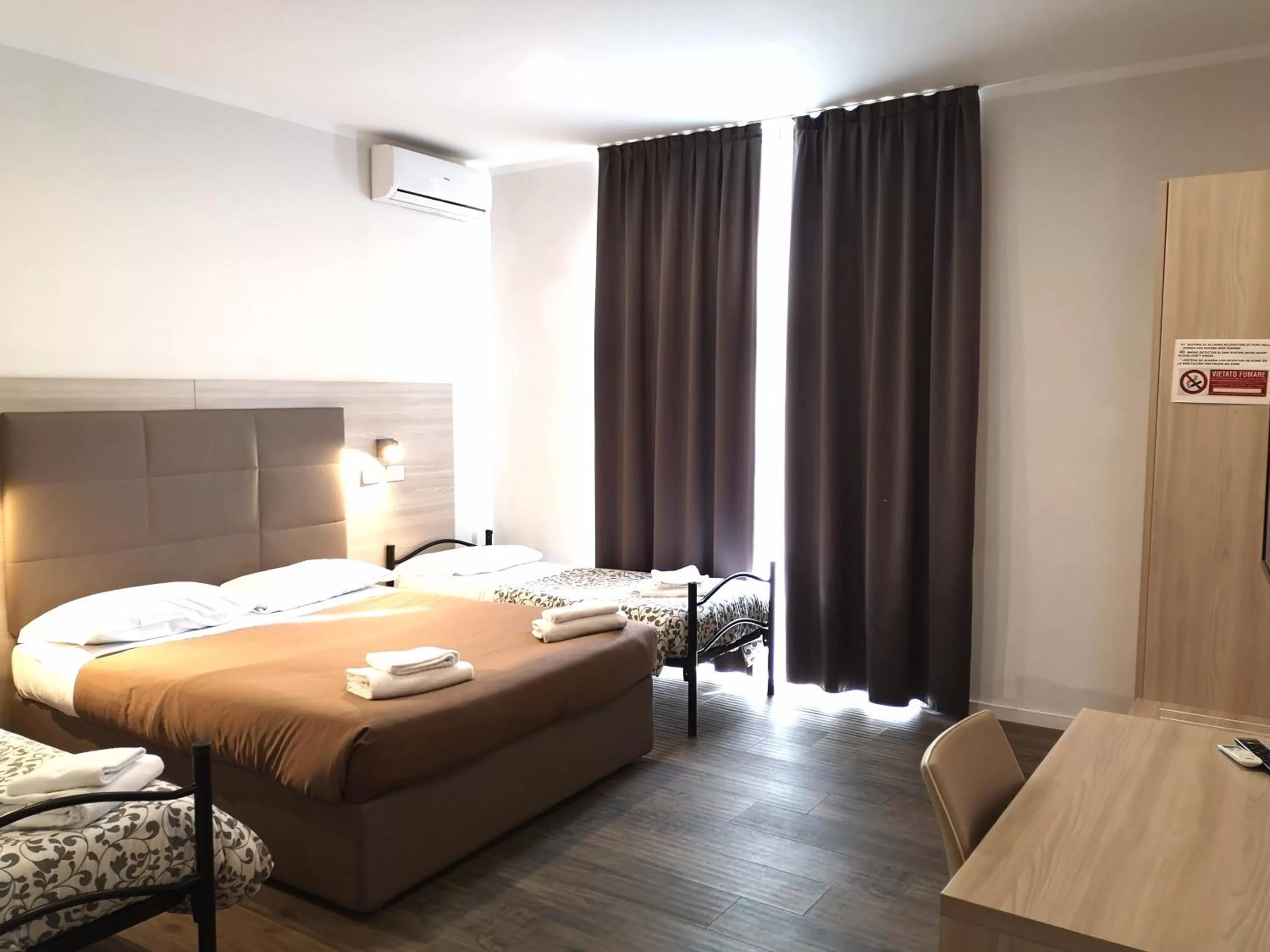 Bed in Academy Hotel