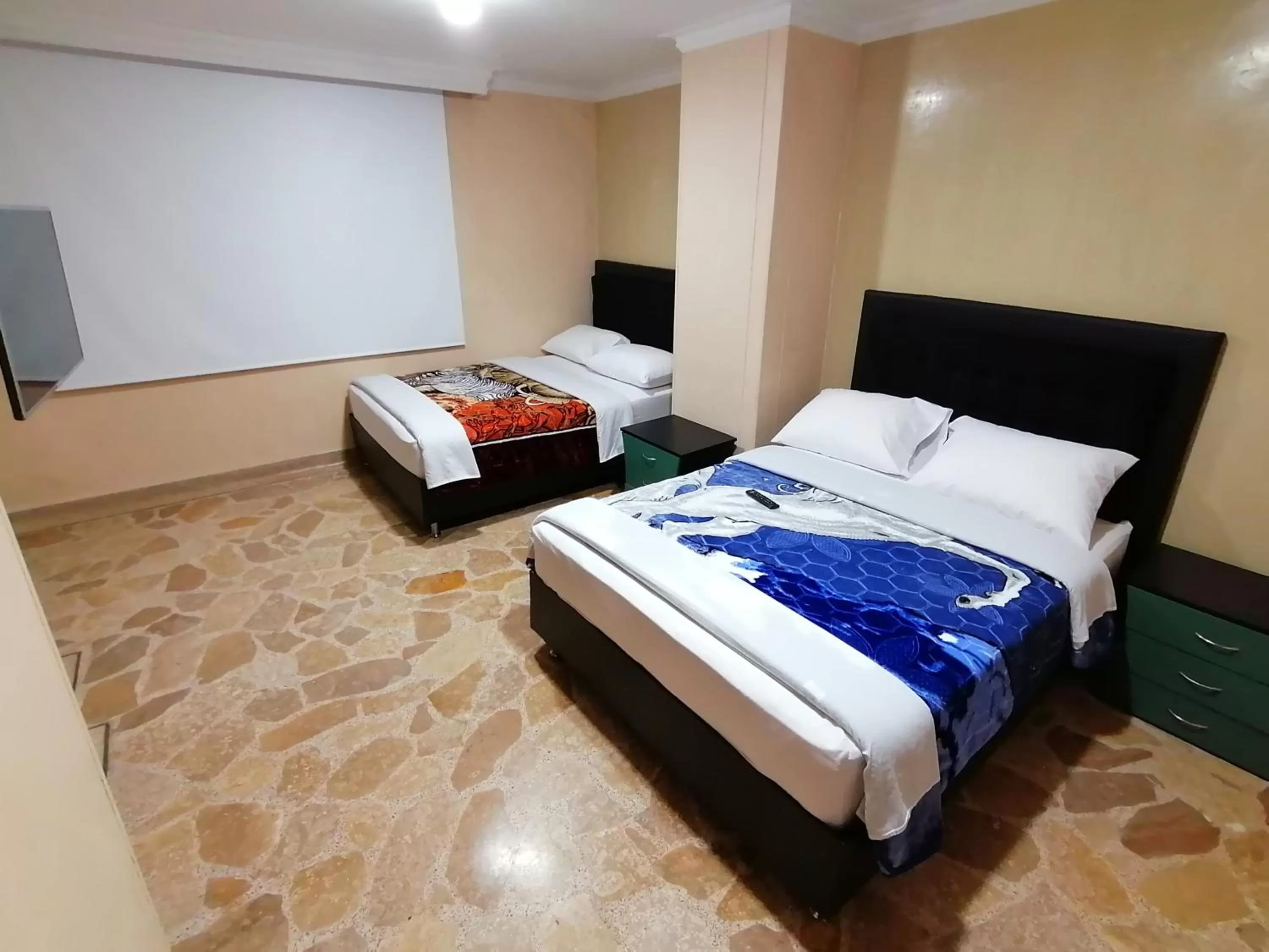 Bed in HOTEL GOLDEN SUITE