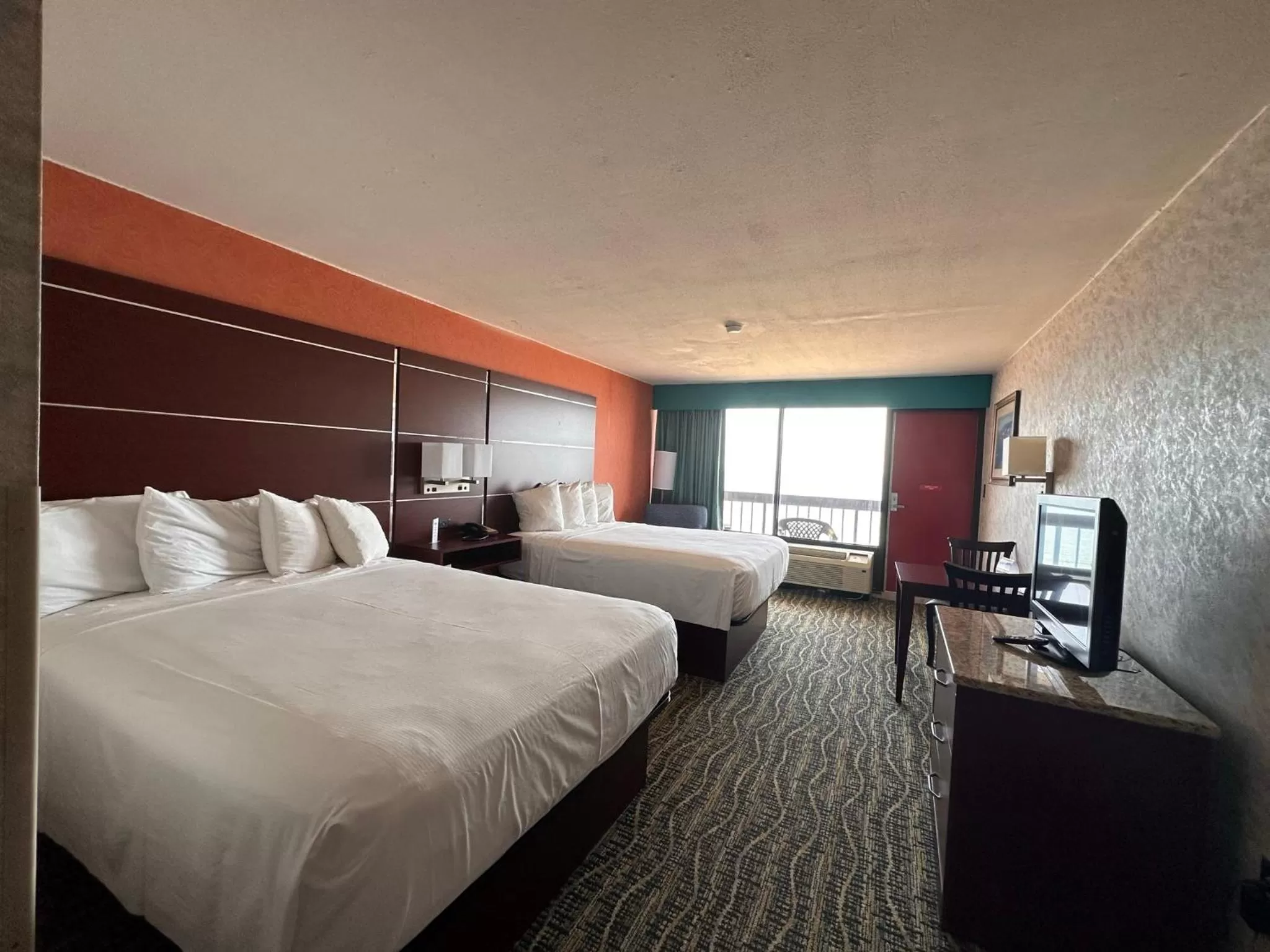 Bedroom in The Breakers Resort Inn