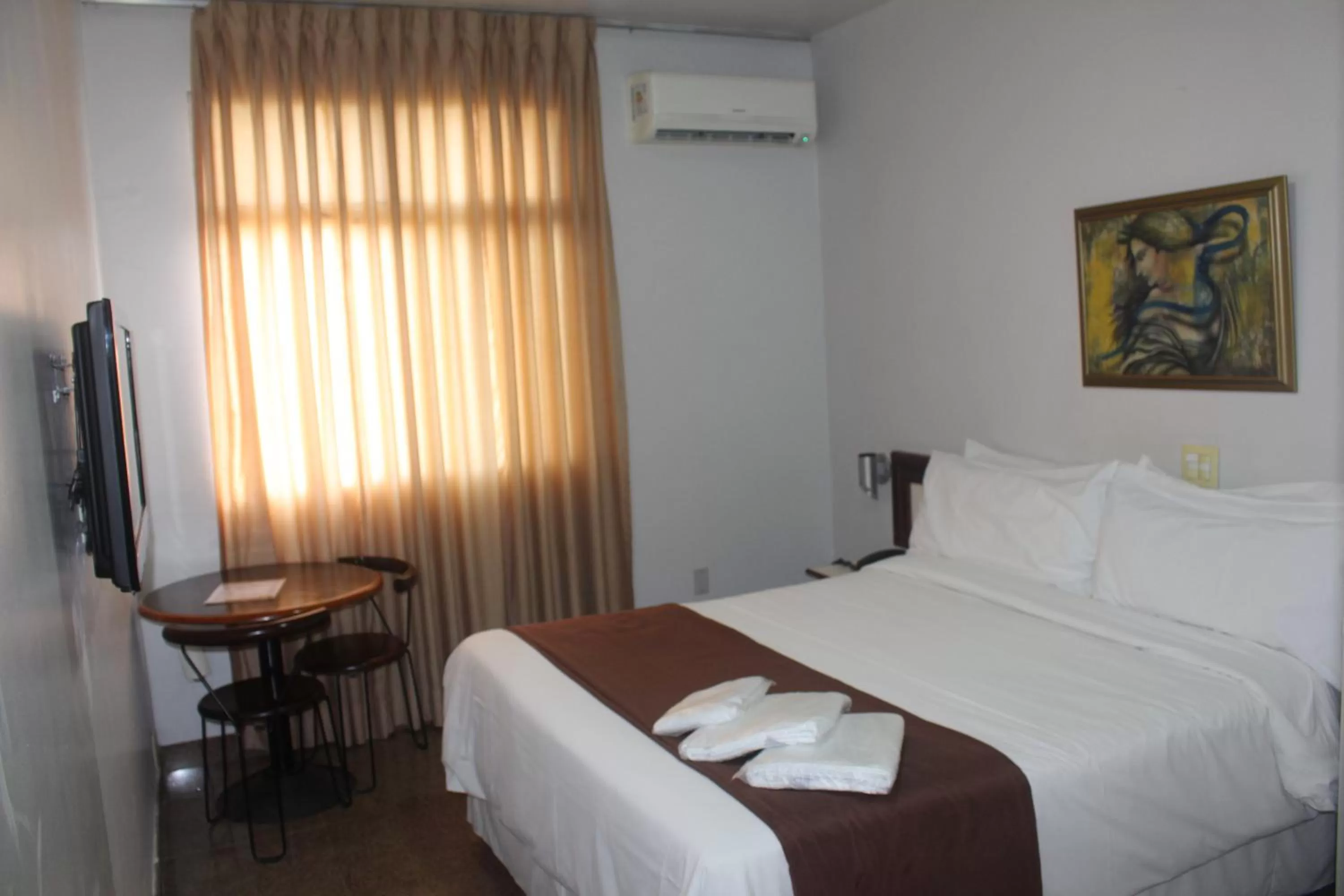 Bed in Hotel Oscar Econômico