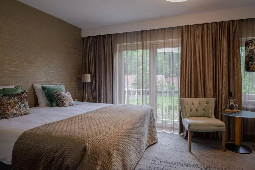 Bed in Boutique Hotel Slenaker Vallei - Buitengewoongenieten