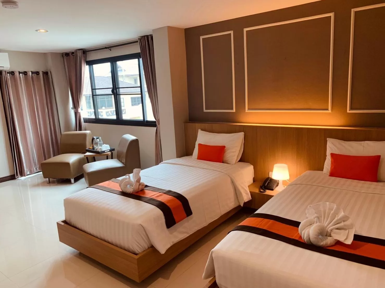 Bed in De Hug Hotel & Residence