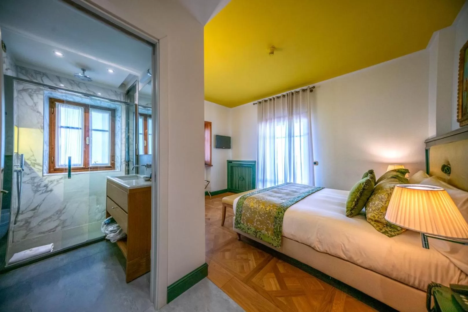 Bed in Ambra Cortina Luxury&Fashion Hotel