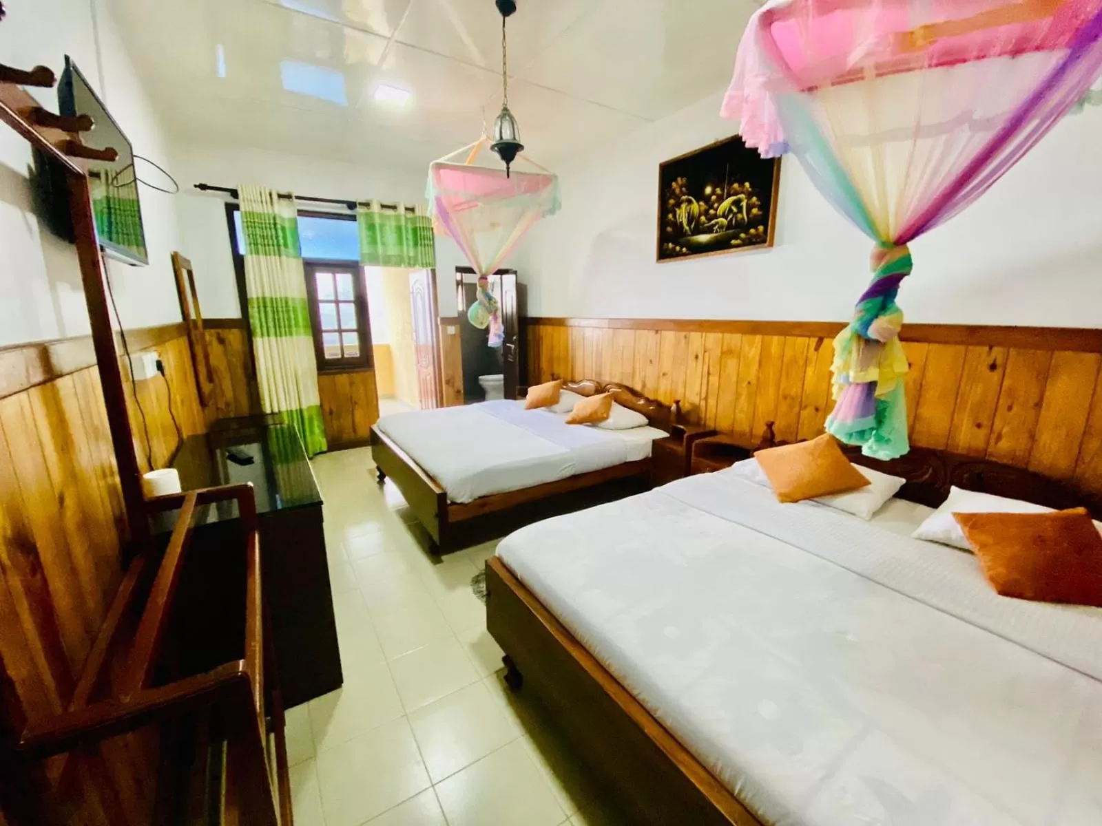 Bed in Srilak View Holiday Inn