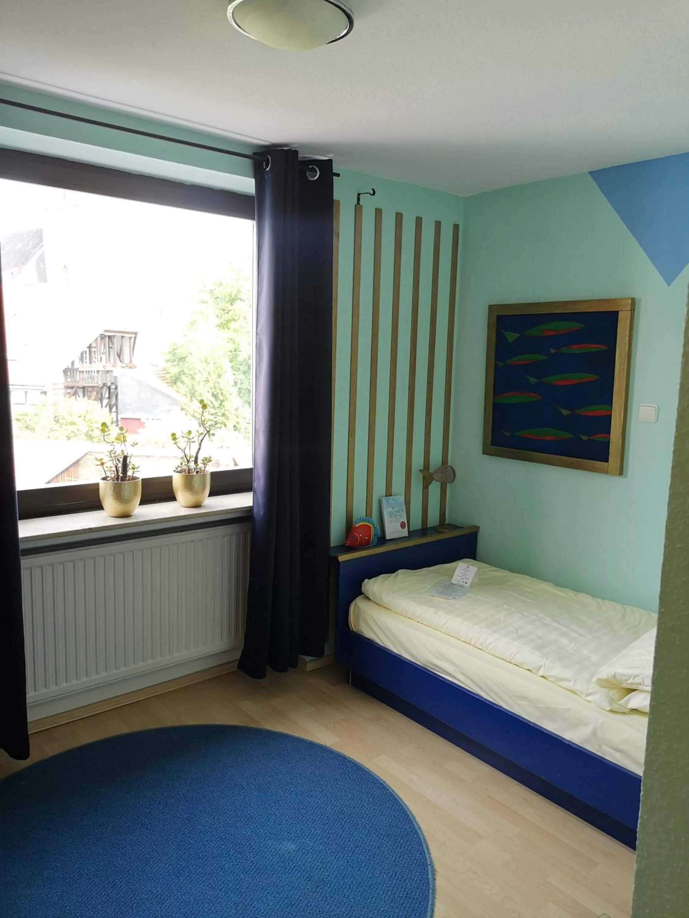 Photo of the whole room, Bed in Hotel Goldflair am Rathaus