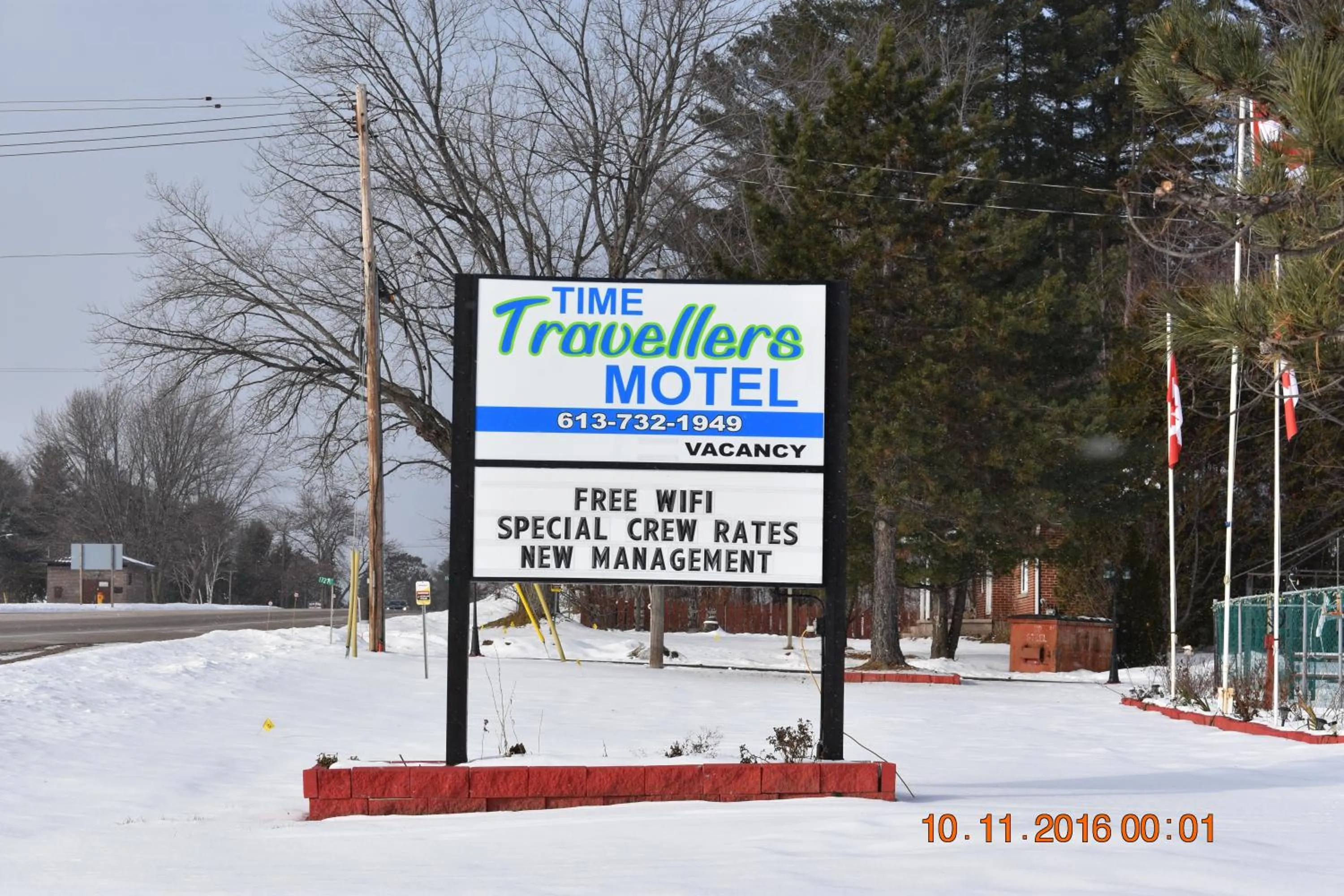 Property logo or sign in Time Travellers Motel