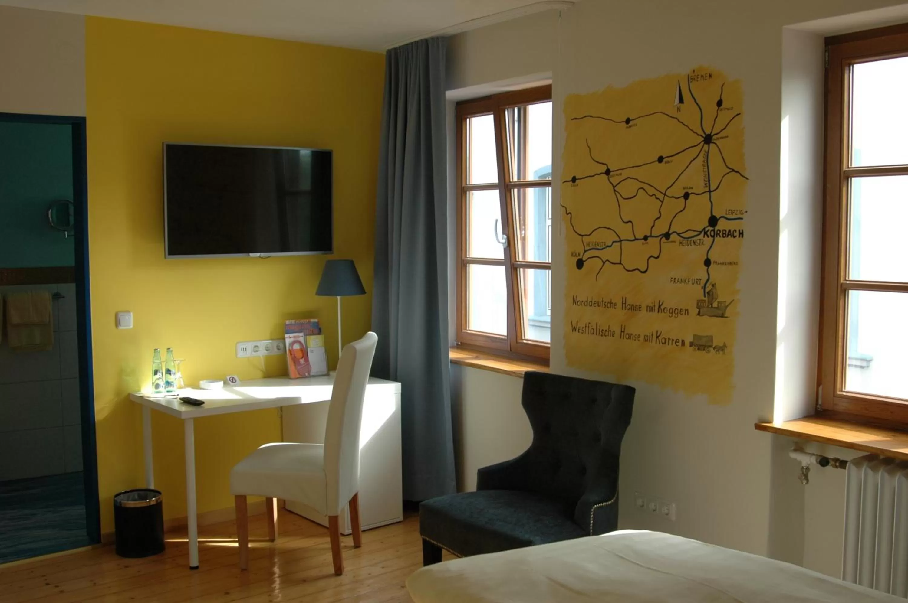 Photo of the whole room, Bed in Hotel Goldflair am Rathaus