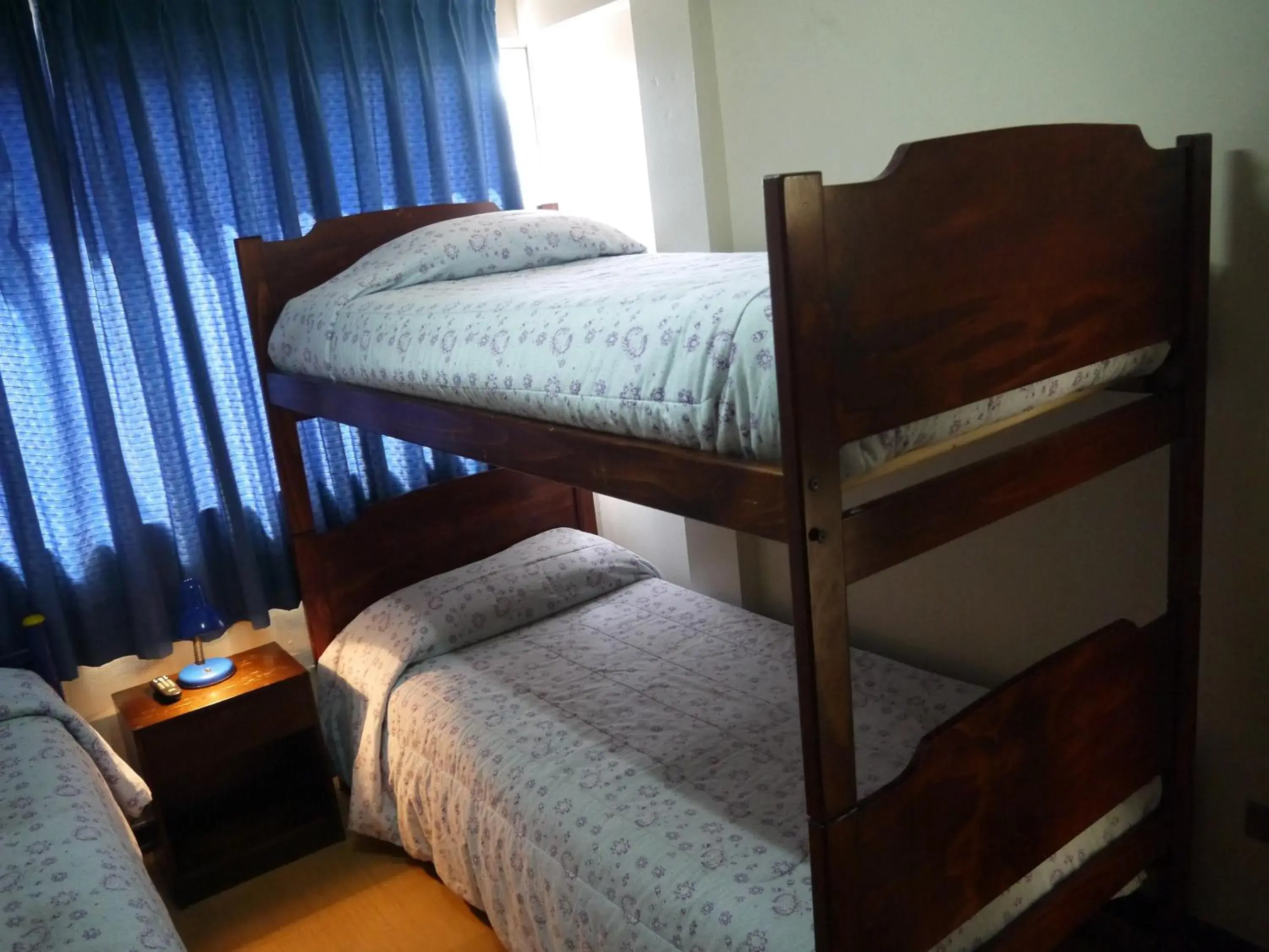 Quadruple Room with Private Bathroom in Hostal Americano Quadruple Room with Private Bathroom in Hostal Americano