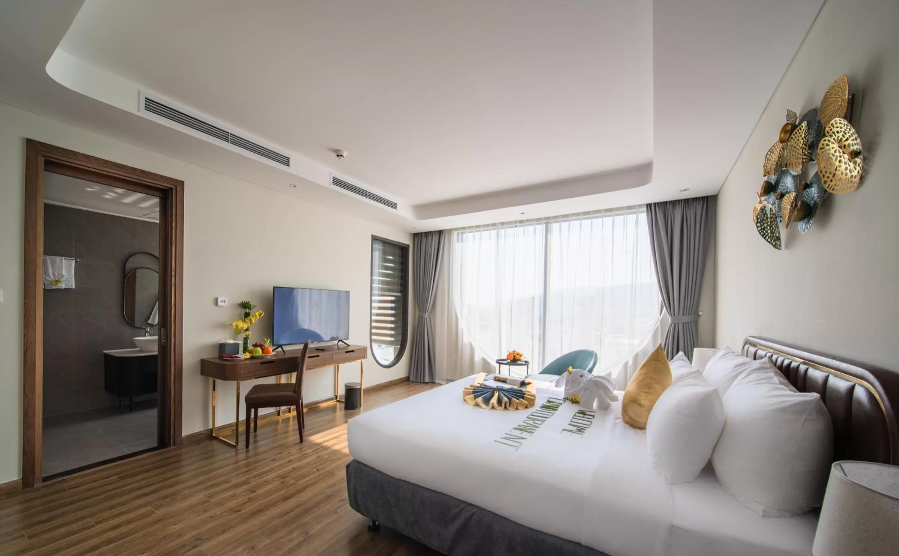 TV and multimedia, Bed in Grand Tourane Nha Trang Hotel