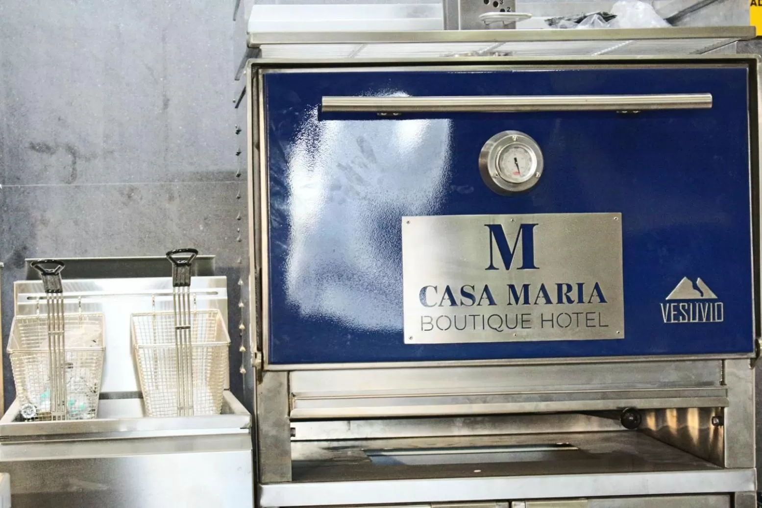 Kitchen or kitchenette in Casa Maria Boutique Hotel