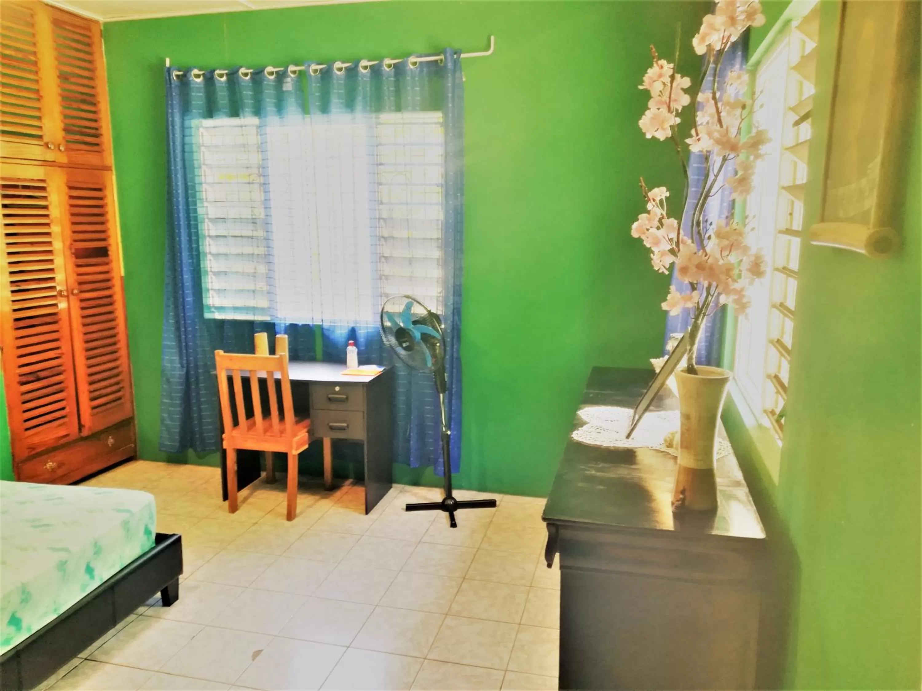 Bed in TOGA GUEST HOUSE