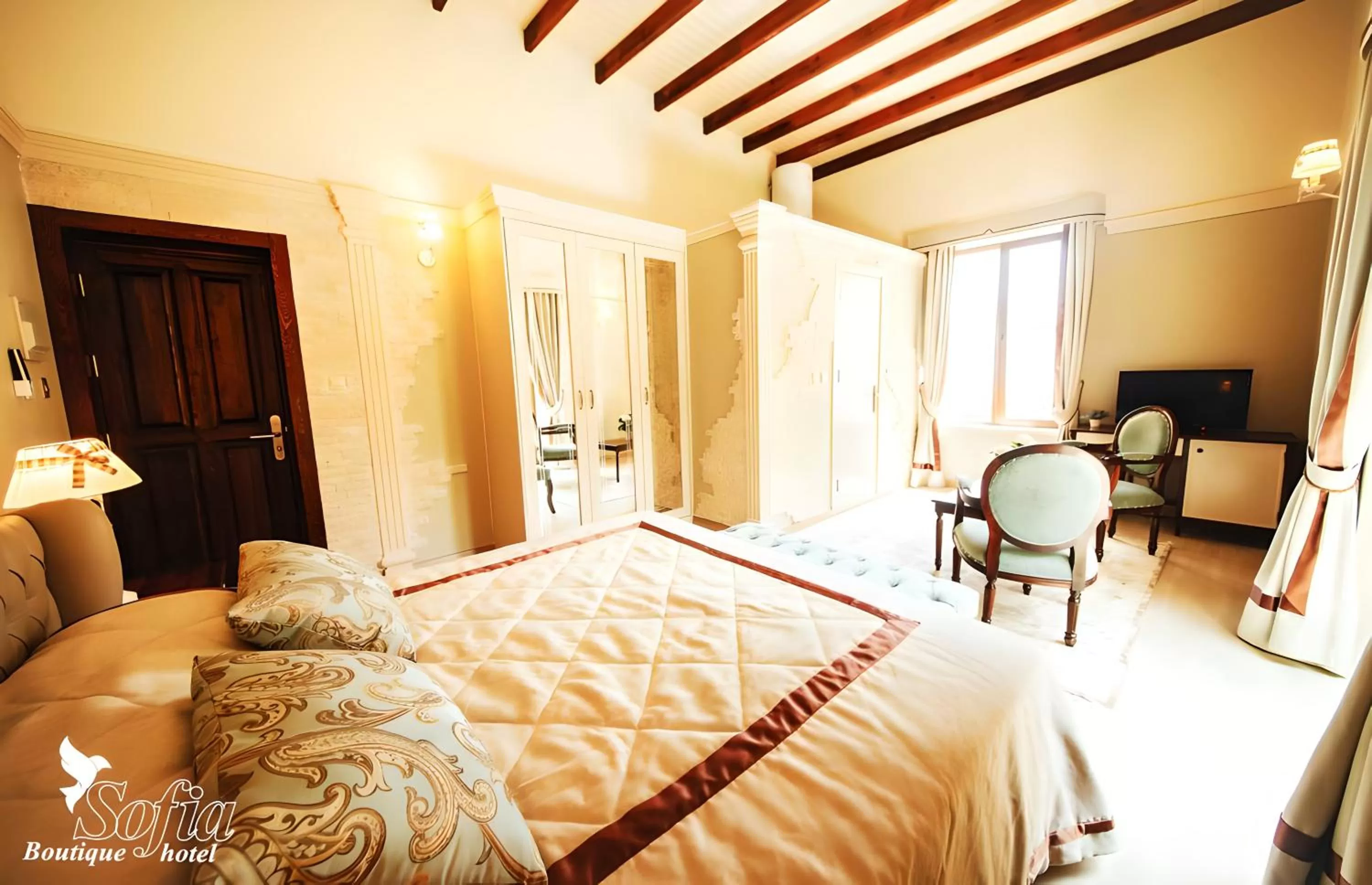 Bed in SOFIA BOUTIQUE HOTEL