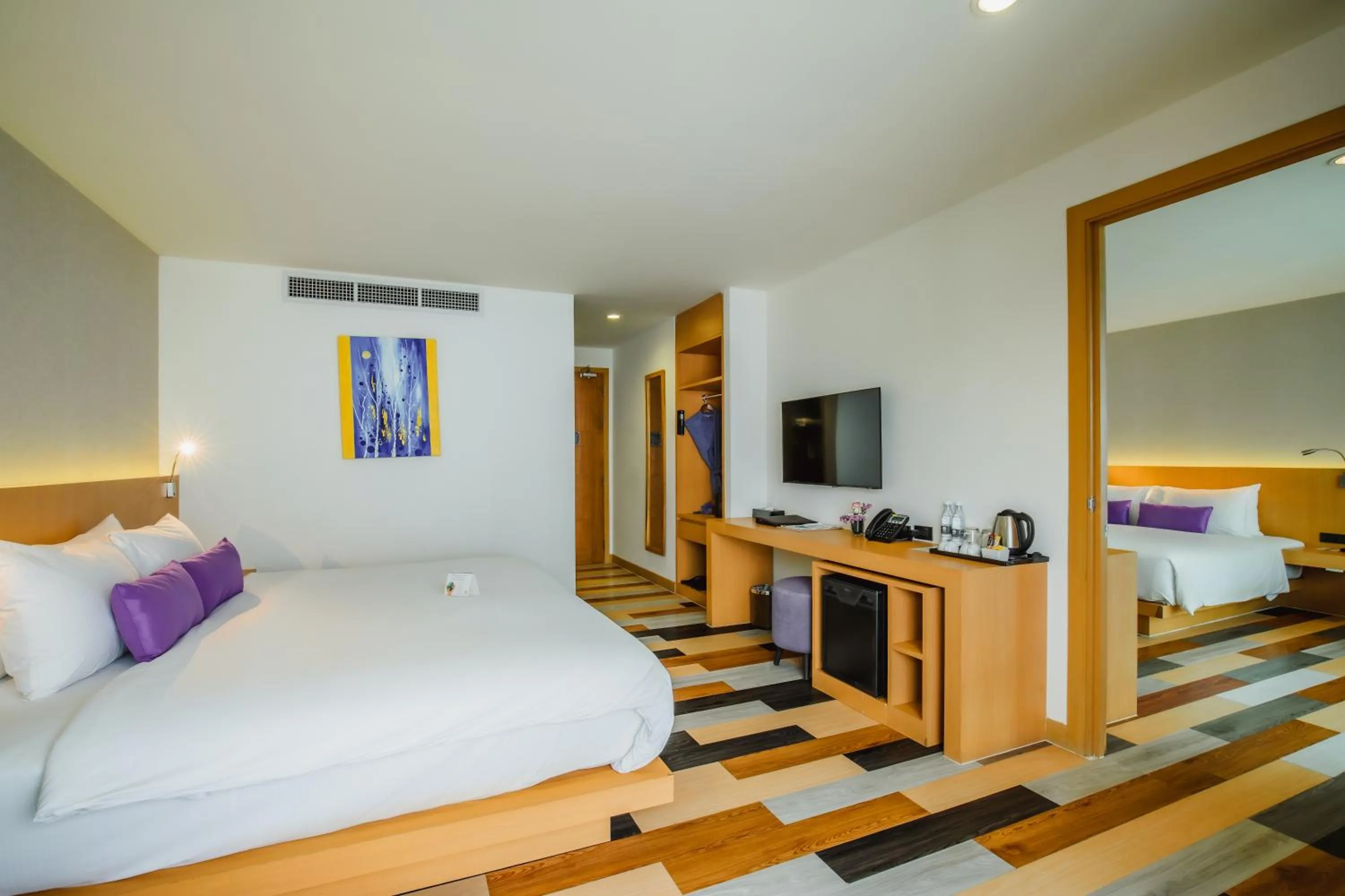 Photo of the whole room, Bed in The Lunar Patong