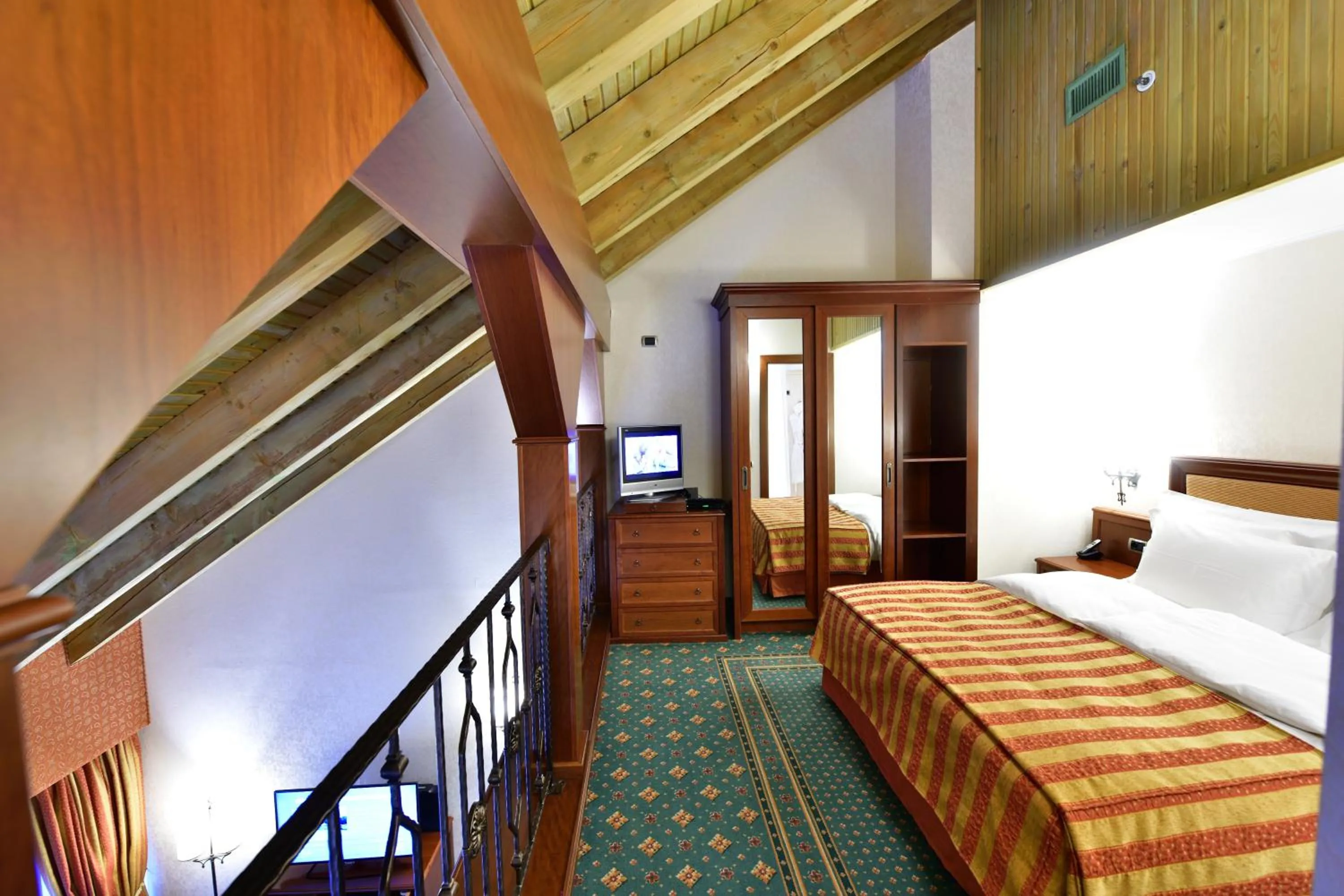 Bed in Lux Garden Hotel