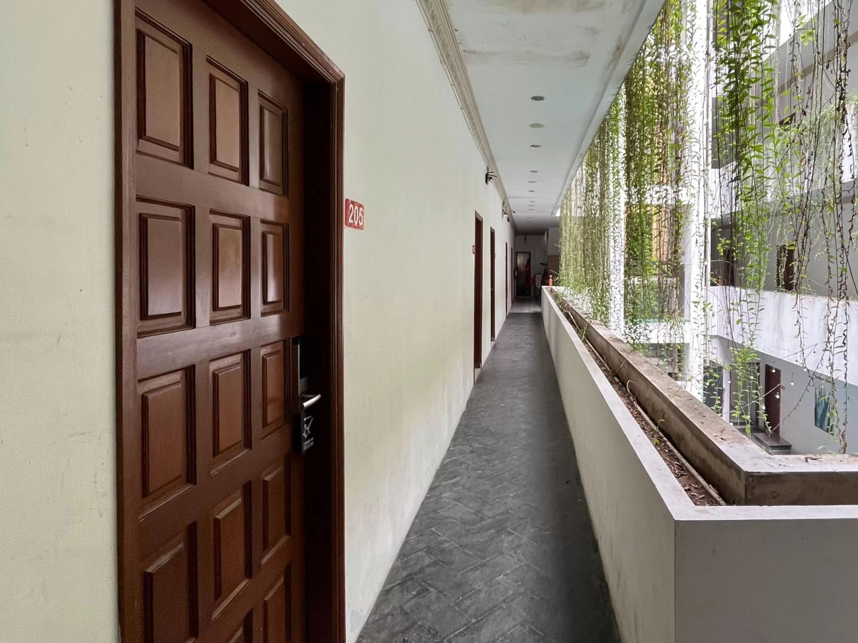 Balcony/Terrace in RedDoorz Premium Syariah at Mutiara Hijau Suites Medan