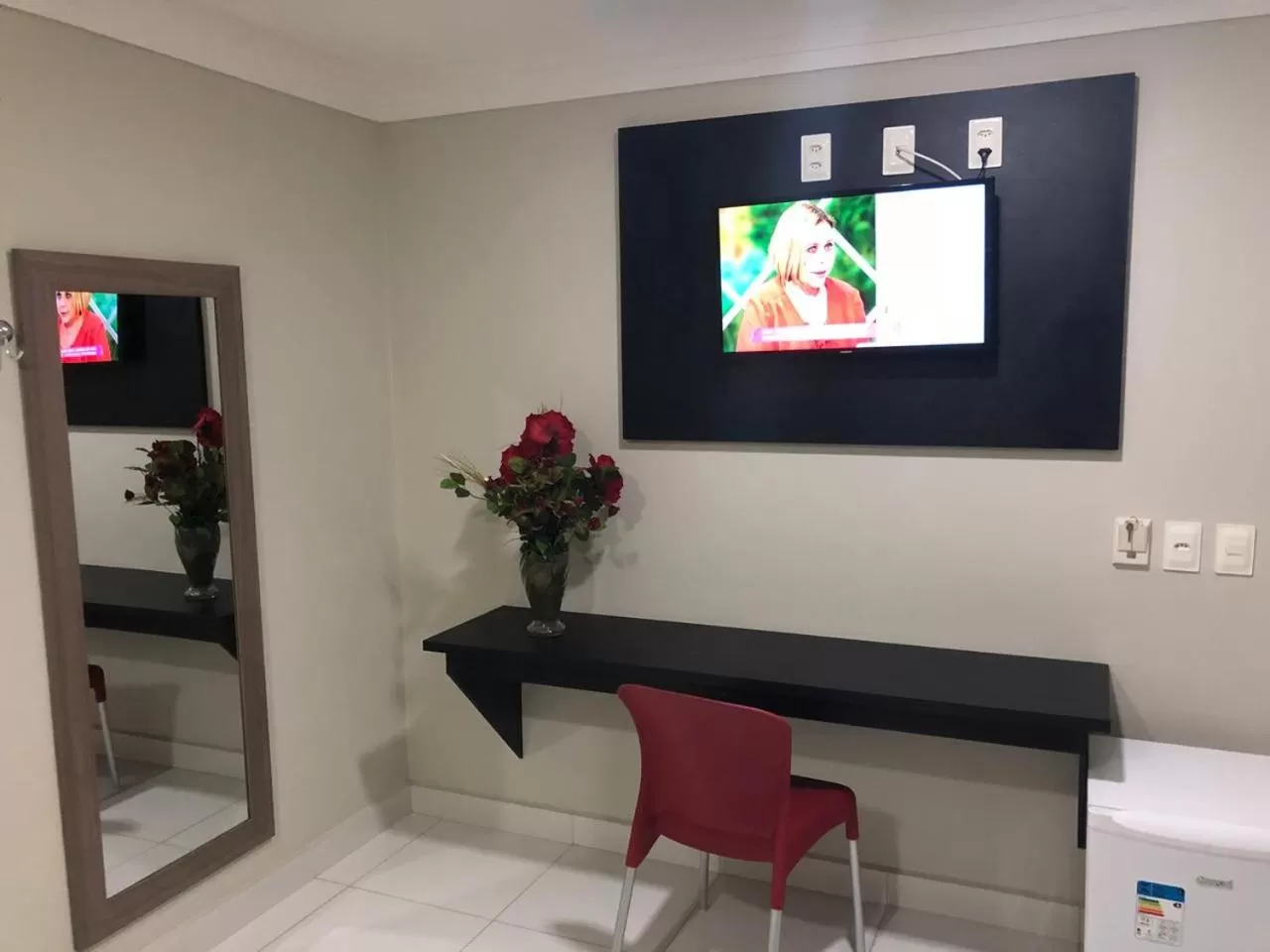 Communal lounge/ TV room in Hotel Executivo Boulevard