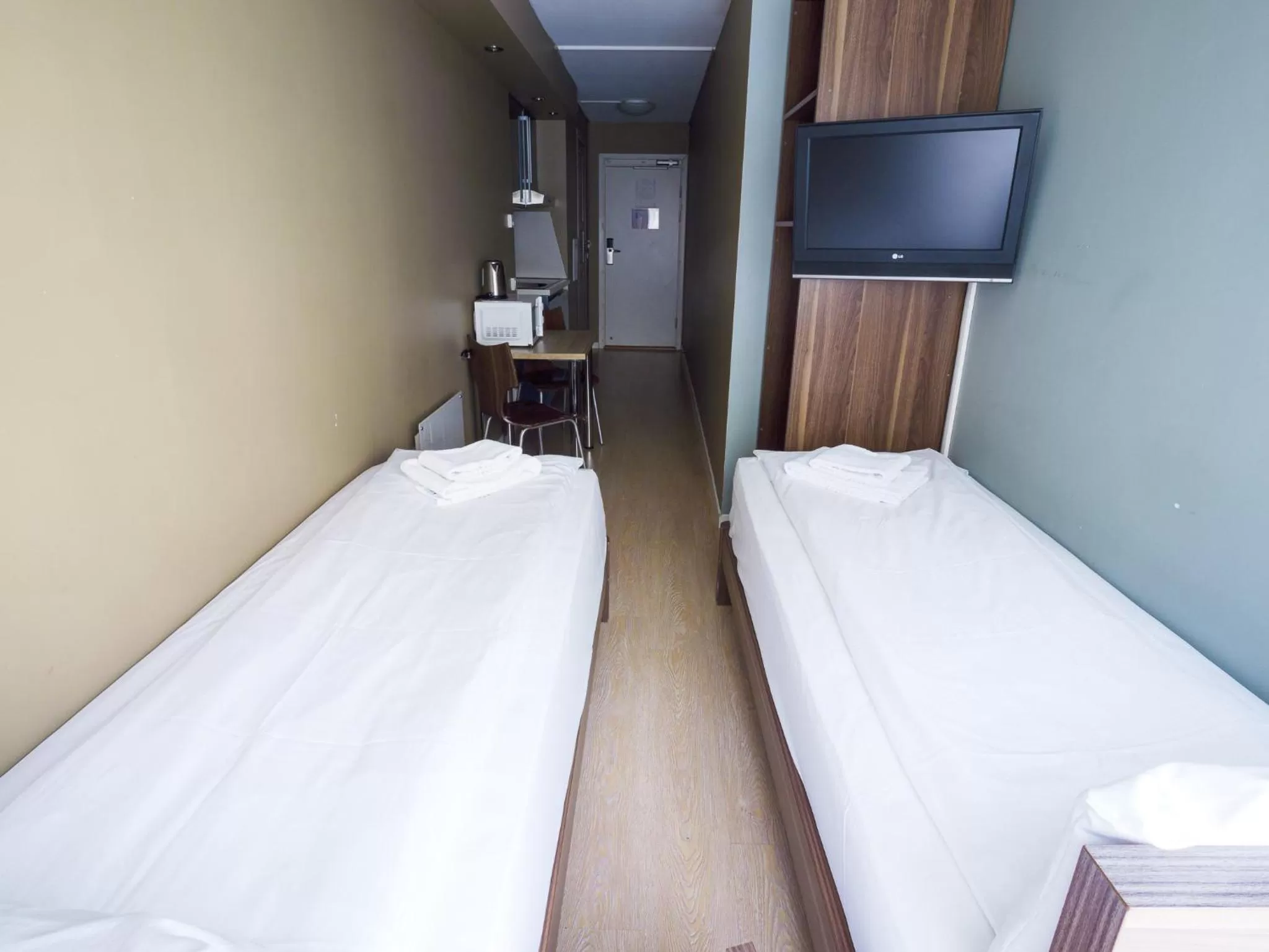 Bed in Central City Apartments