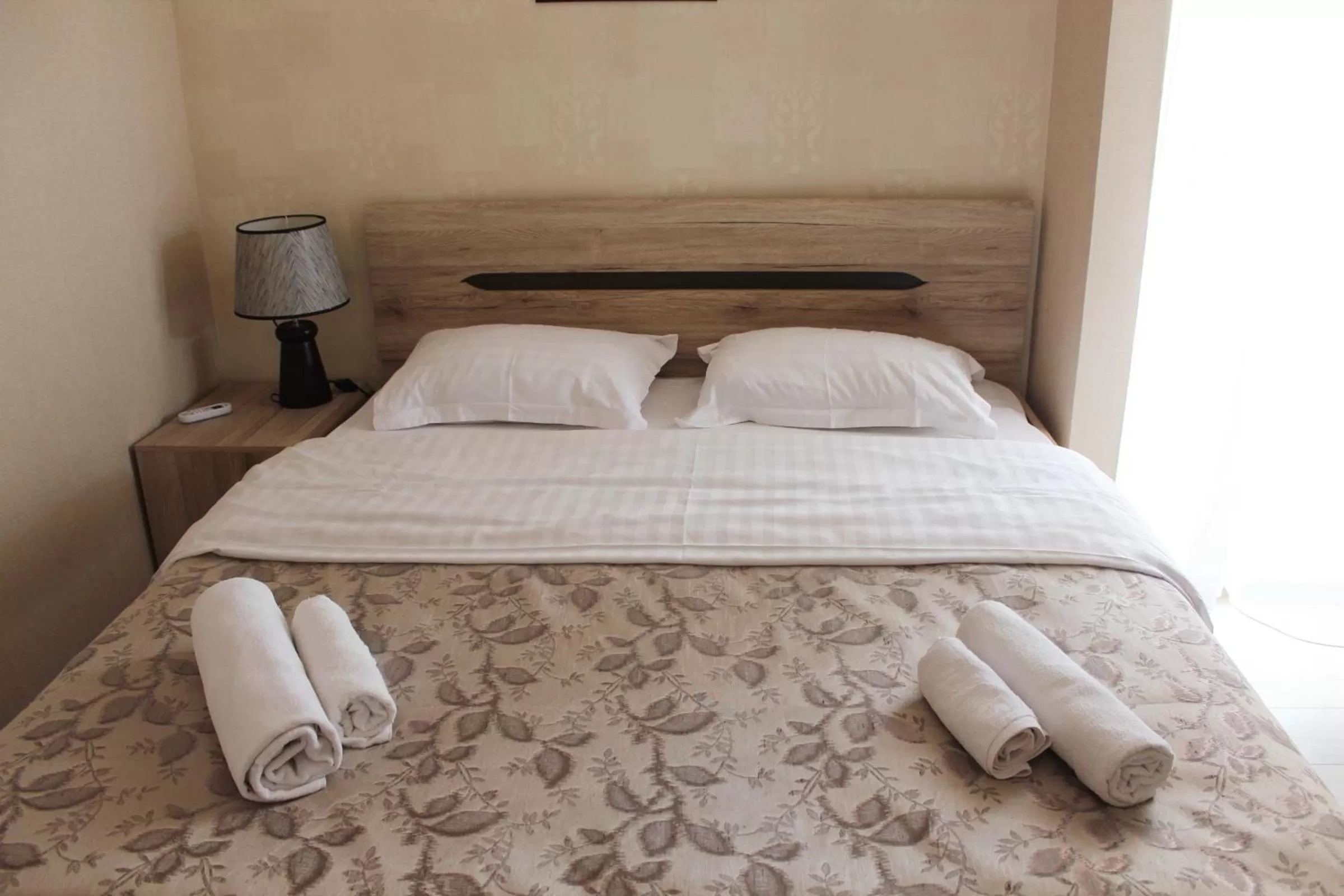 Bed in Hotel Elegant Garden