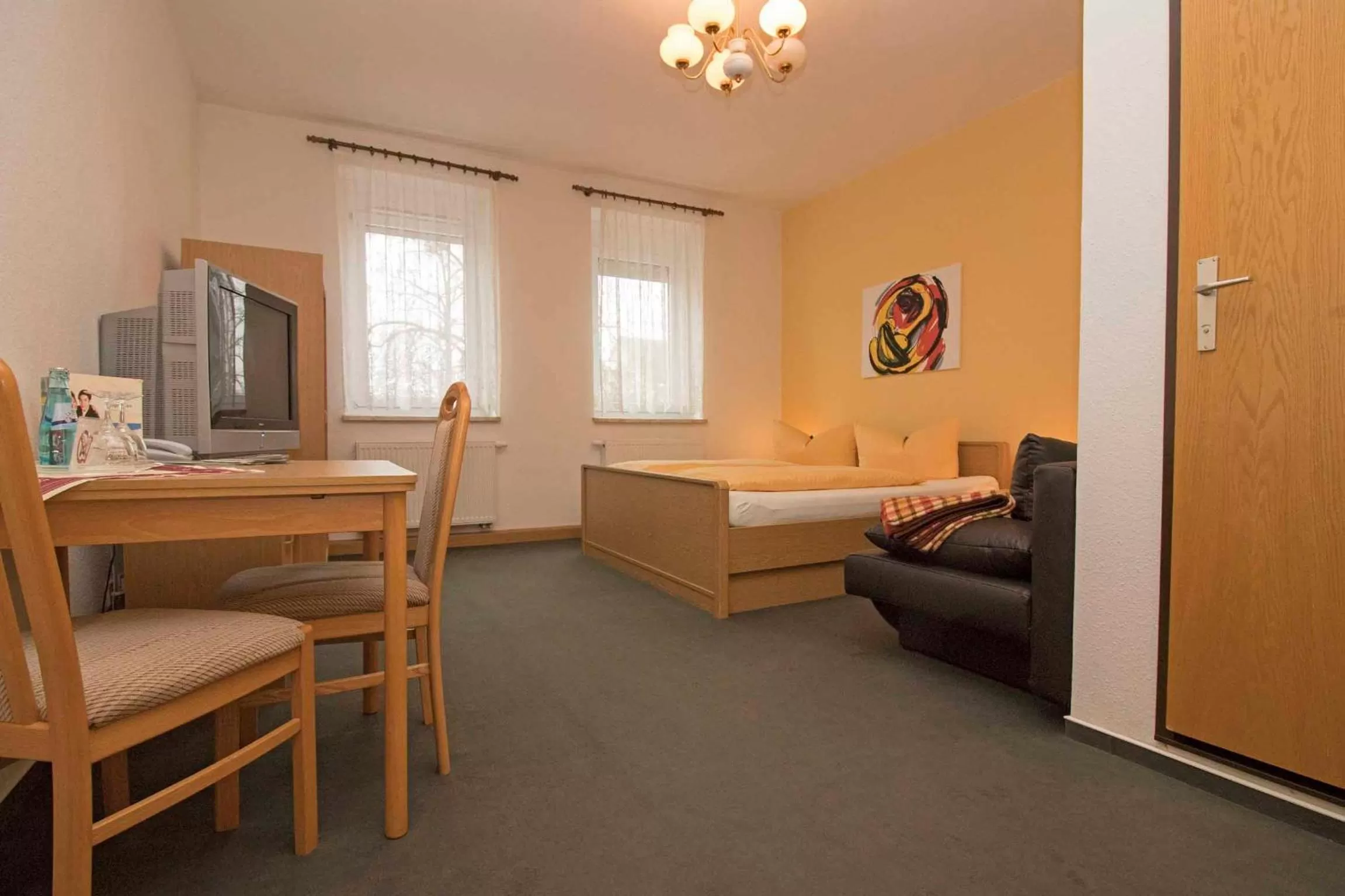 Bed, Seating Area in Bürgerhaus Niesky