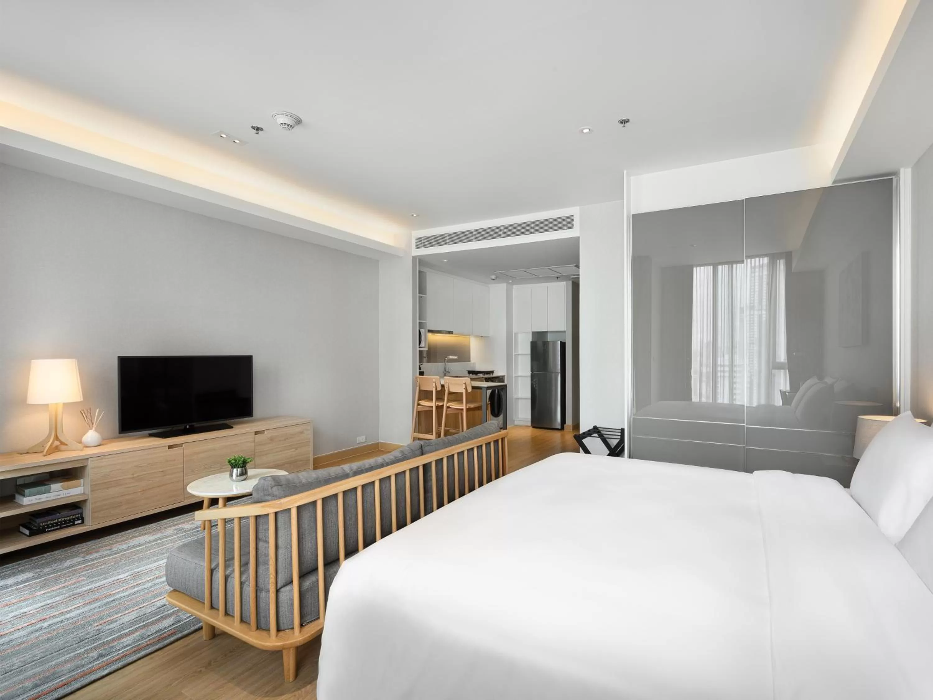 Bed in Oakwood Suites Bangkok