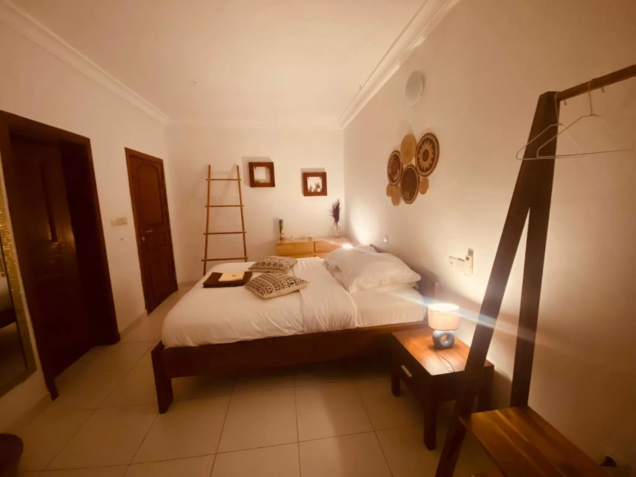 Bed in L'Oasis Guesthouse