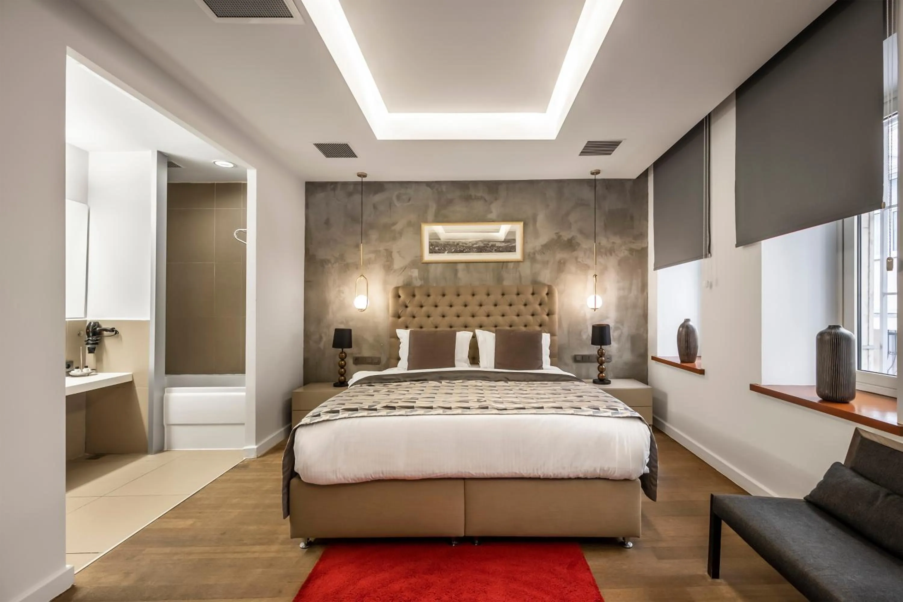 Bed in Ansen Hotel and Suites