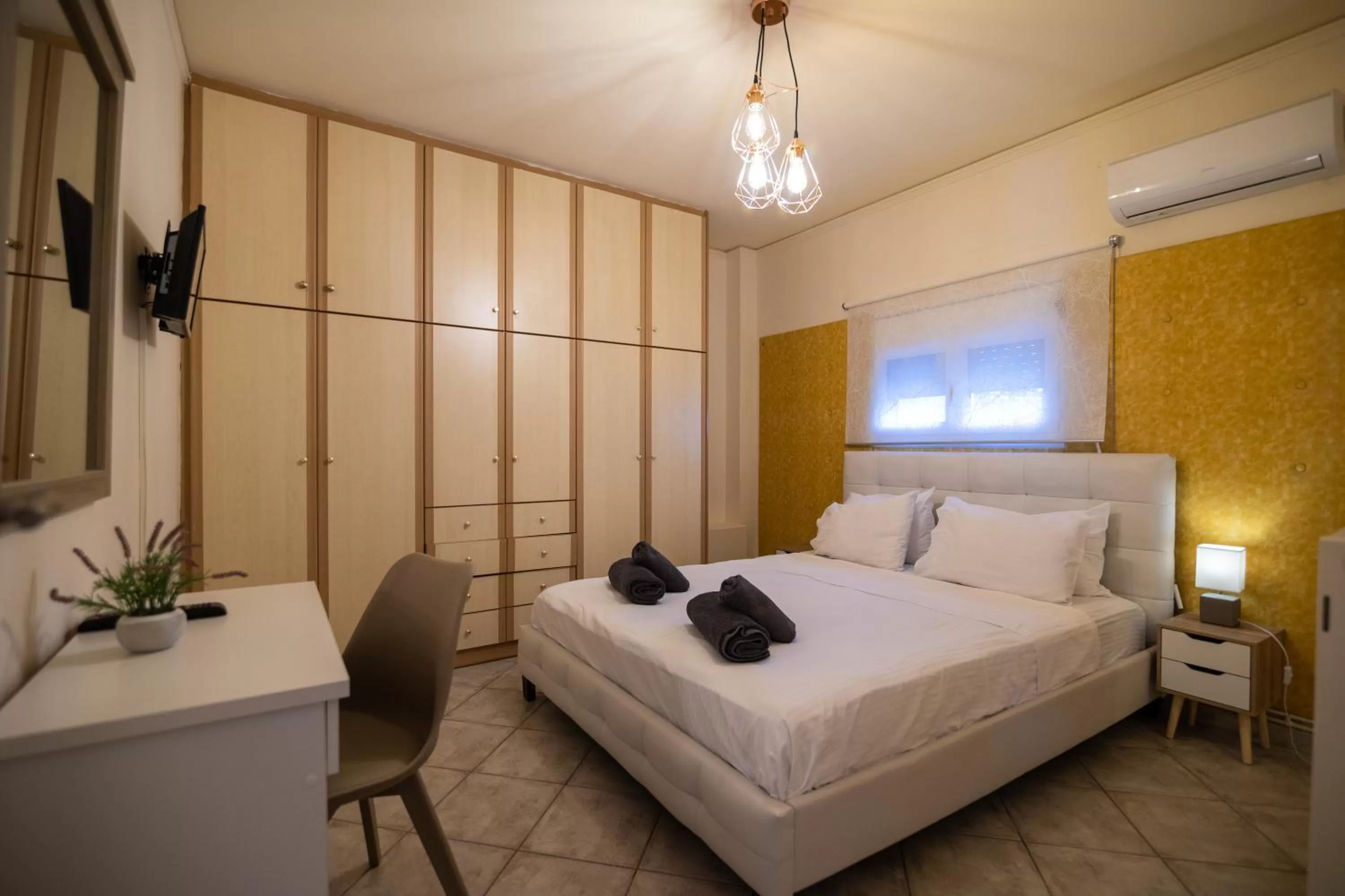 Bed in Votsalakia Hotel & Luxury Apartments