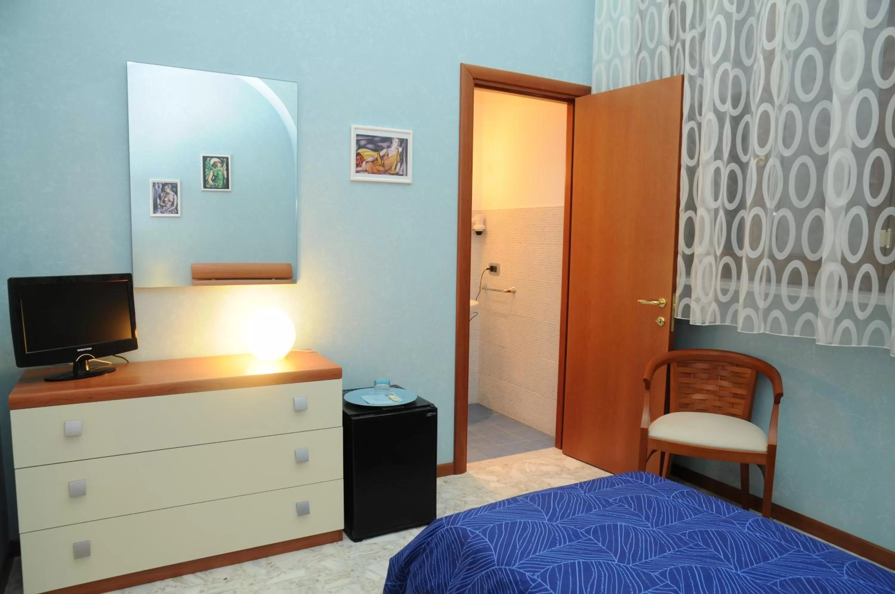 Bed in Affittacamere Conte Di Cavour