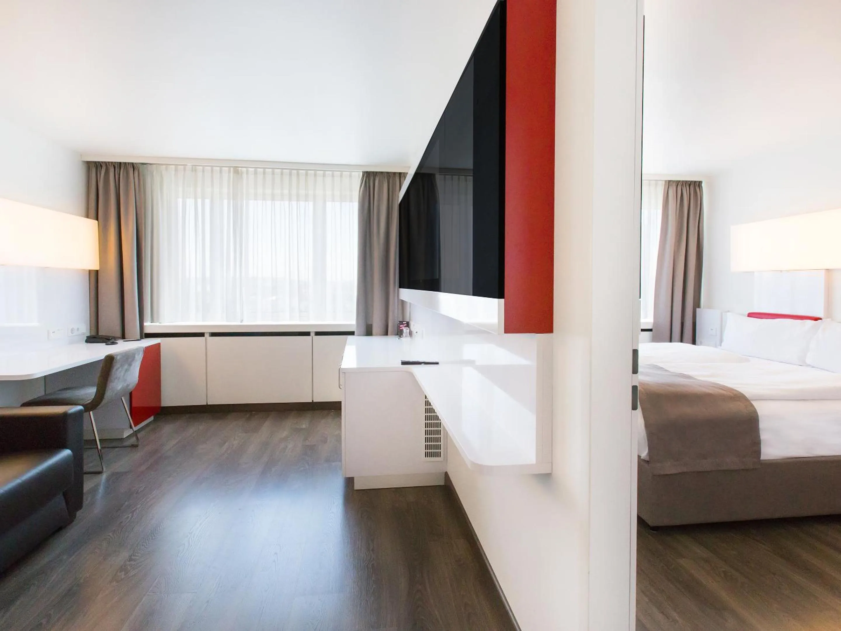 Photo of the whole room, Bed in DORMERO Hotel Stuttgart