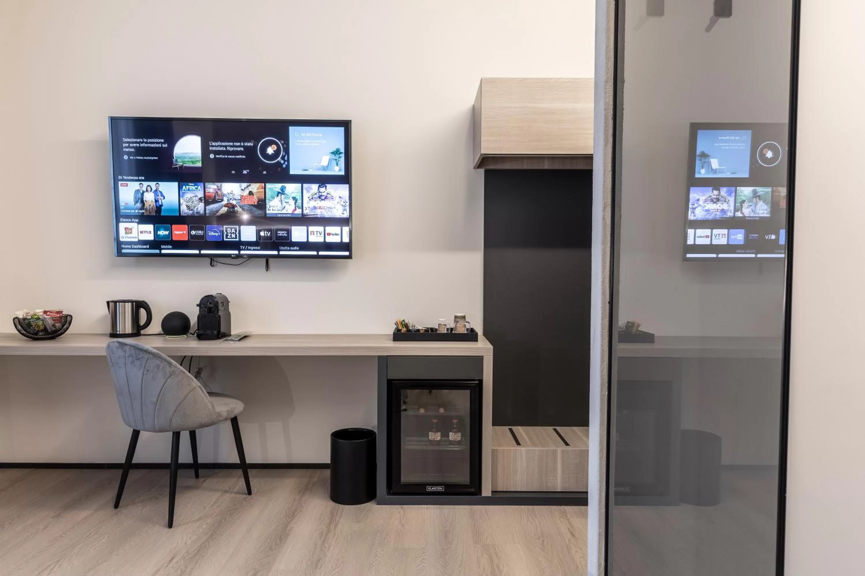 TV and multimedia, TV/Entertainment Center in Corso 84 Luxury Suites