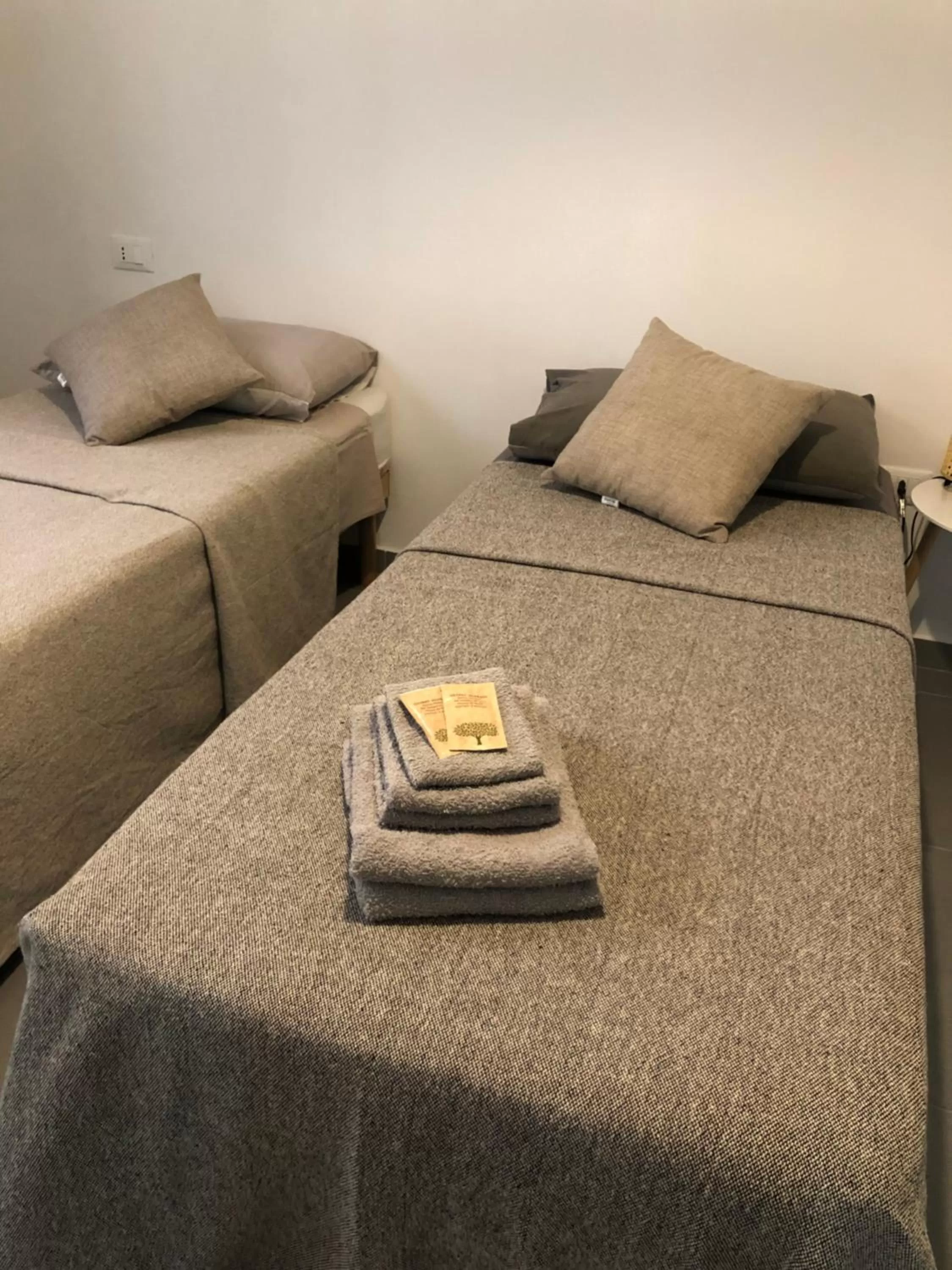 Bed, Seating Area in B&B BELLAMI'