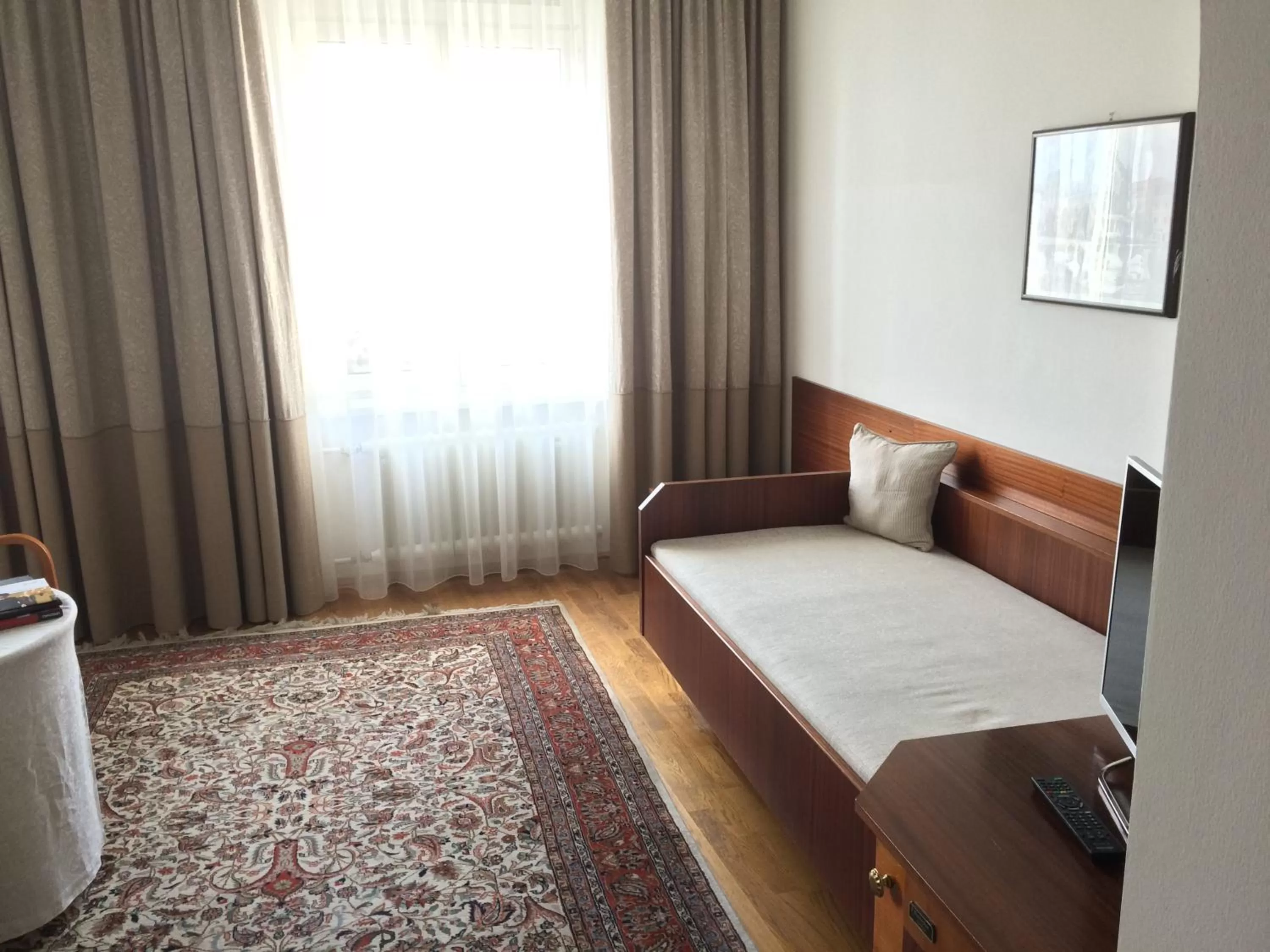 Photo of the whole room, Bed in Seehotel Schwan