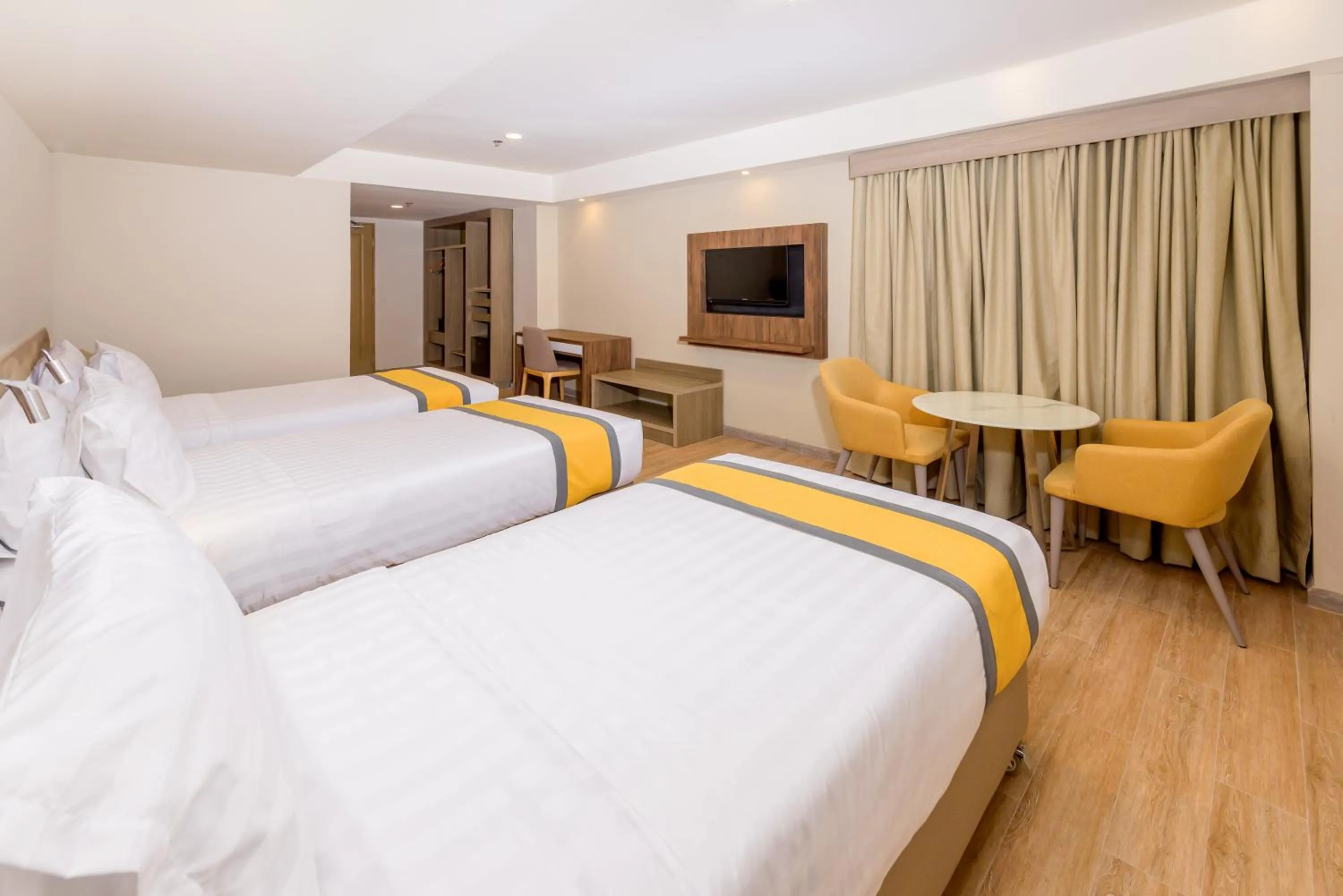 Bed in SureStay Plus by Best Western Cebu City