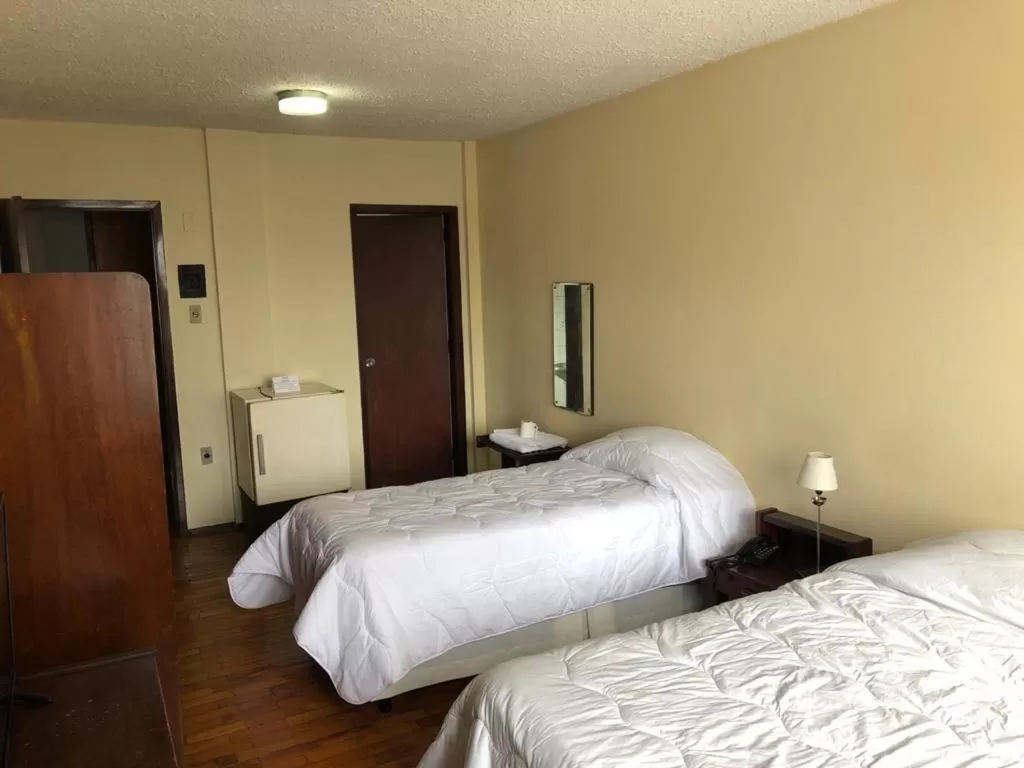 Bed in Hotel Estoril