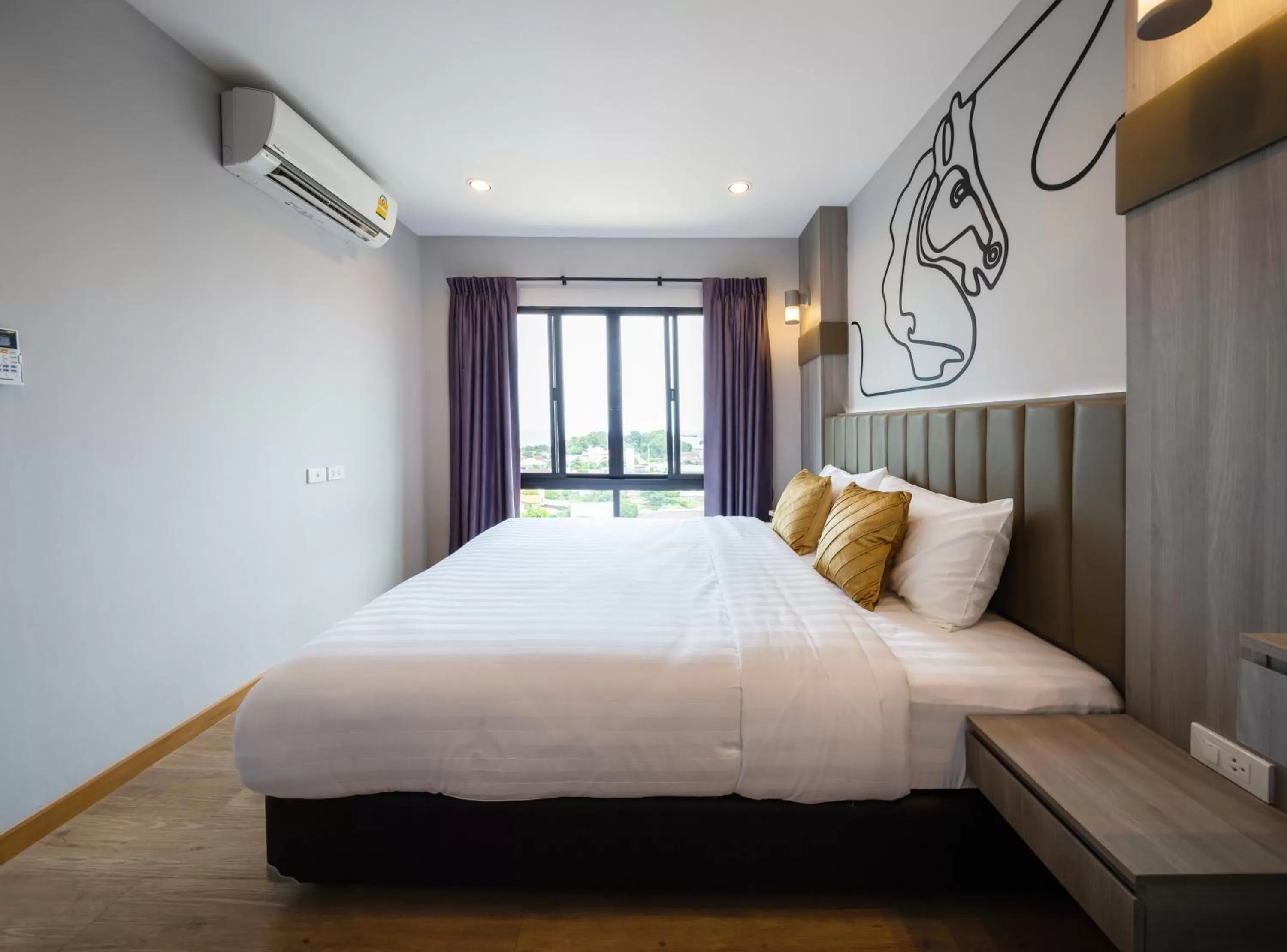 Bed in Horsehill Hotel Sriracha