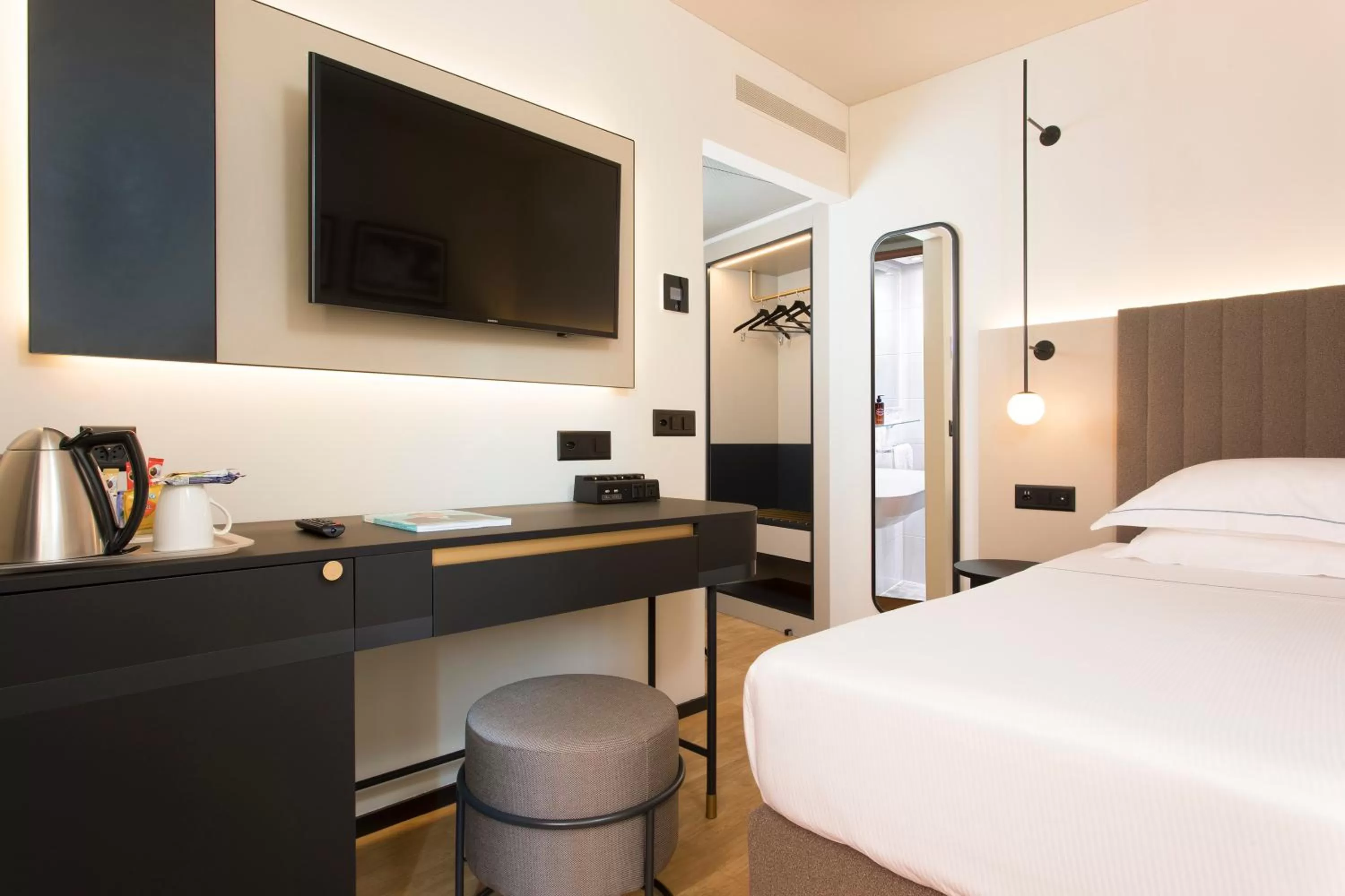 Bed in LUGANODANTE Boutique & Lifestyle Hotel