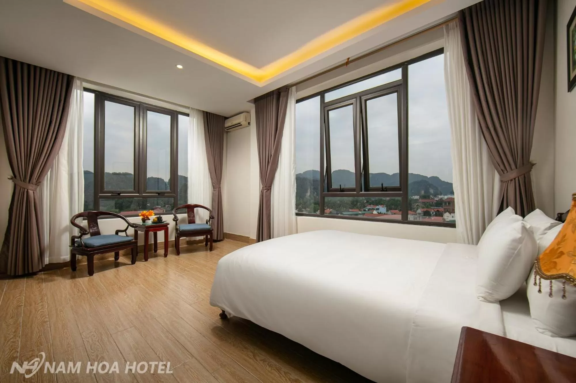 Photo of the whole room, Bed in Nam Hoa Hotel