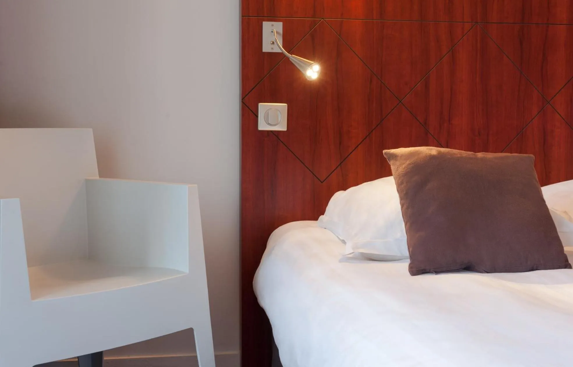 Decorative detail, Bed in The Originals Boutique, Hôtel Le Pariou, Issoire